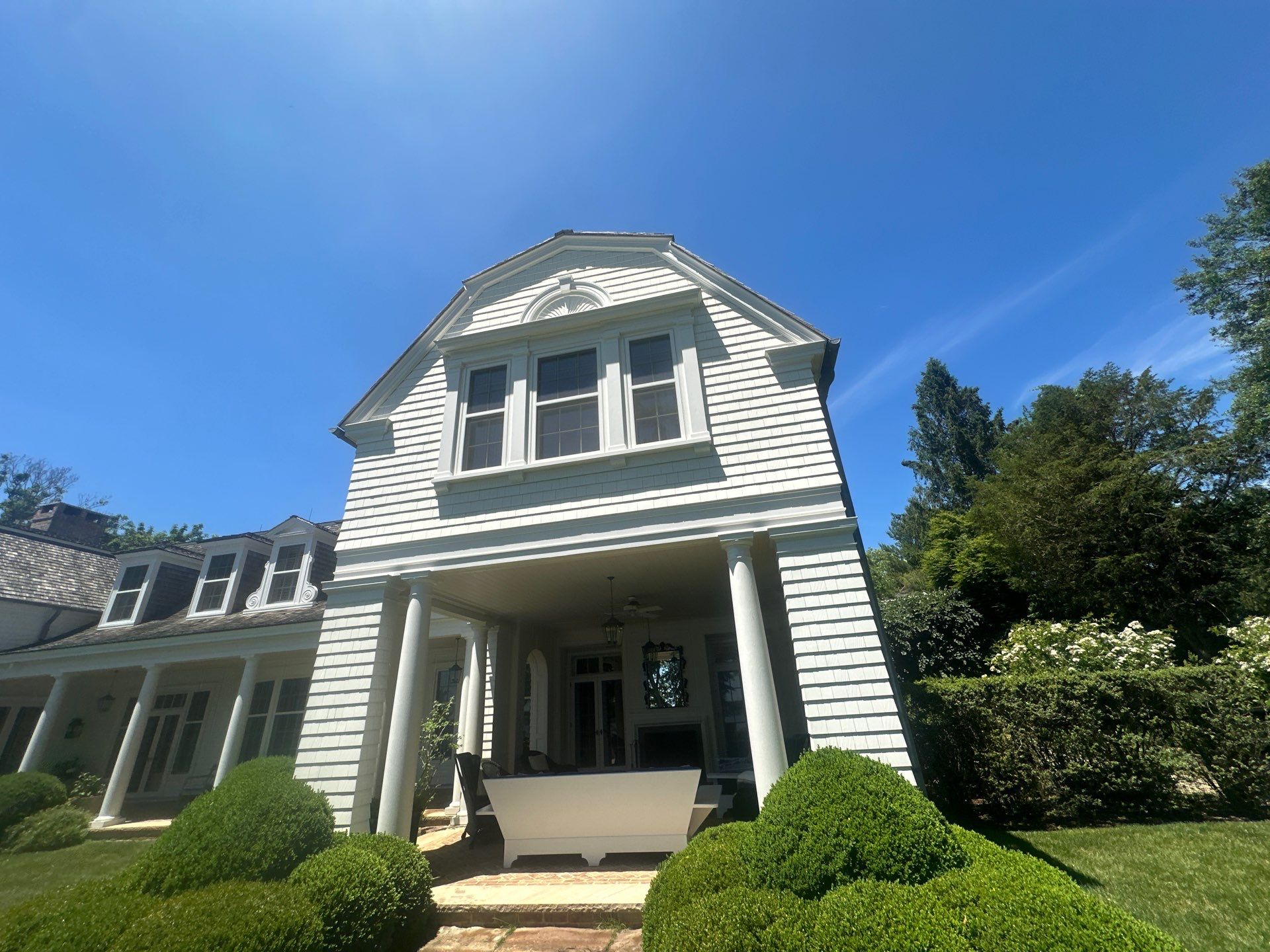 Residential Exterior Renovation Featuring Custom Masonry and Porch Restoration by Pure Incs