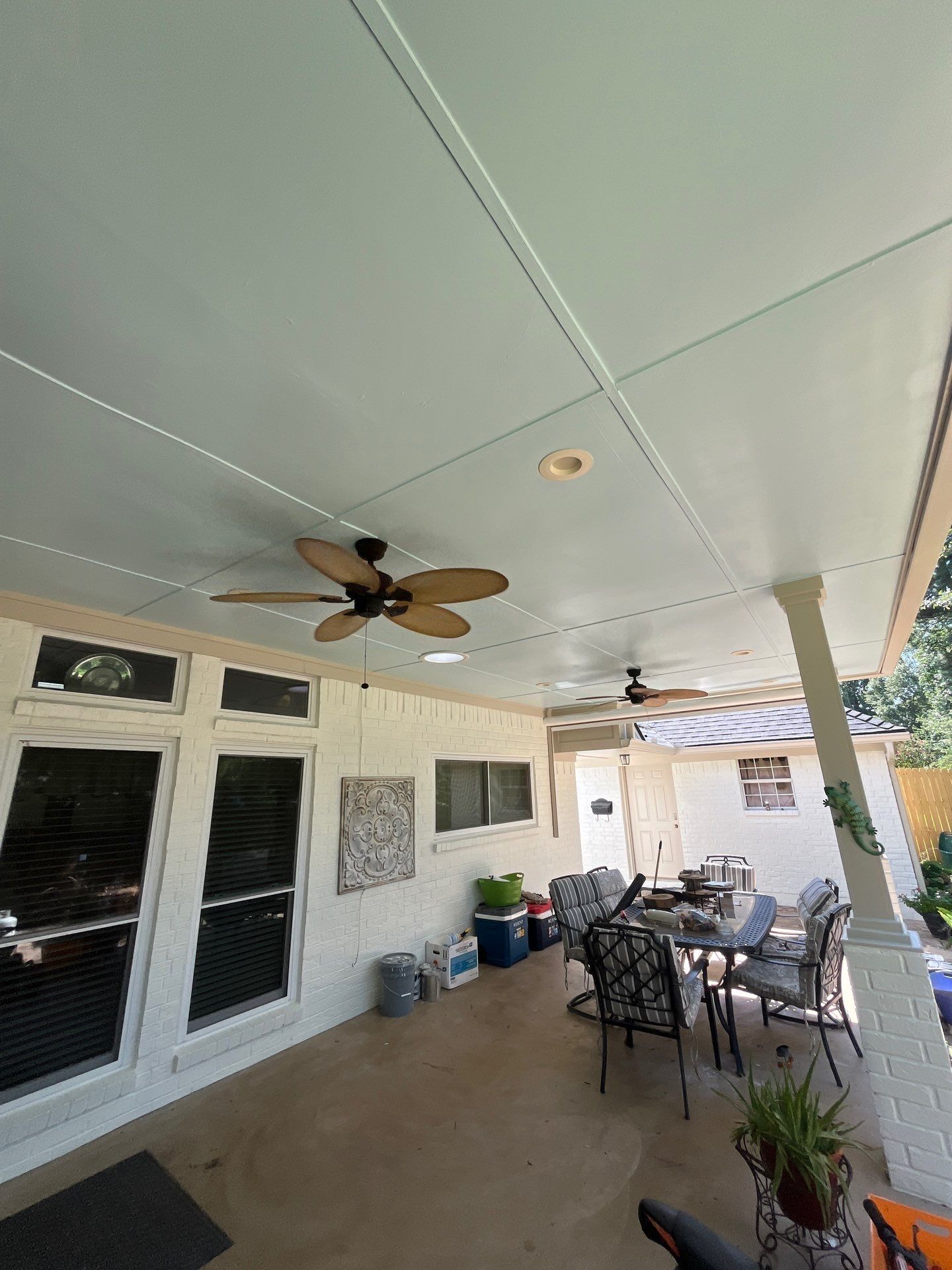 Exterior Painting in Tyler, TX | Brick House with White & Blue Finish by Quality Coats Painting