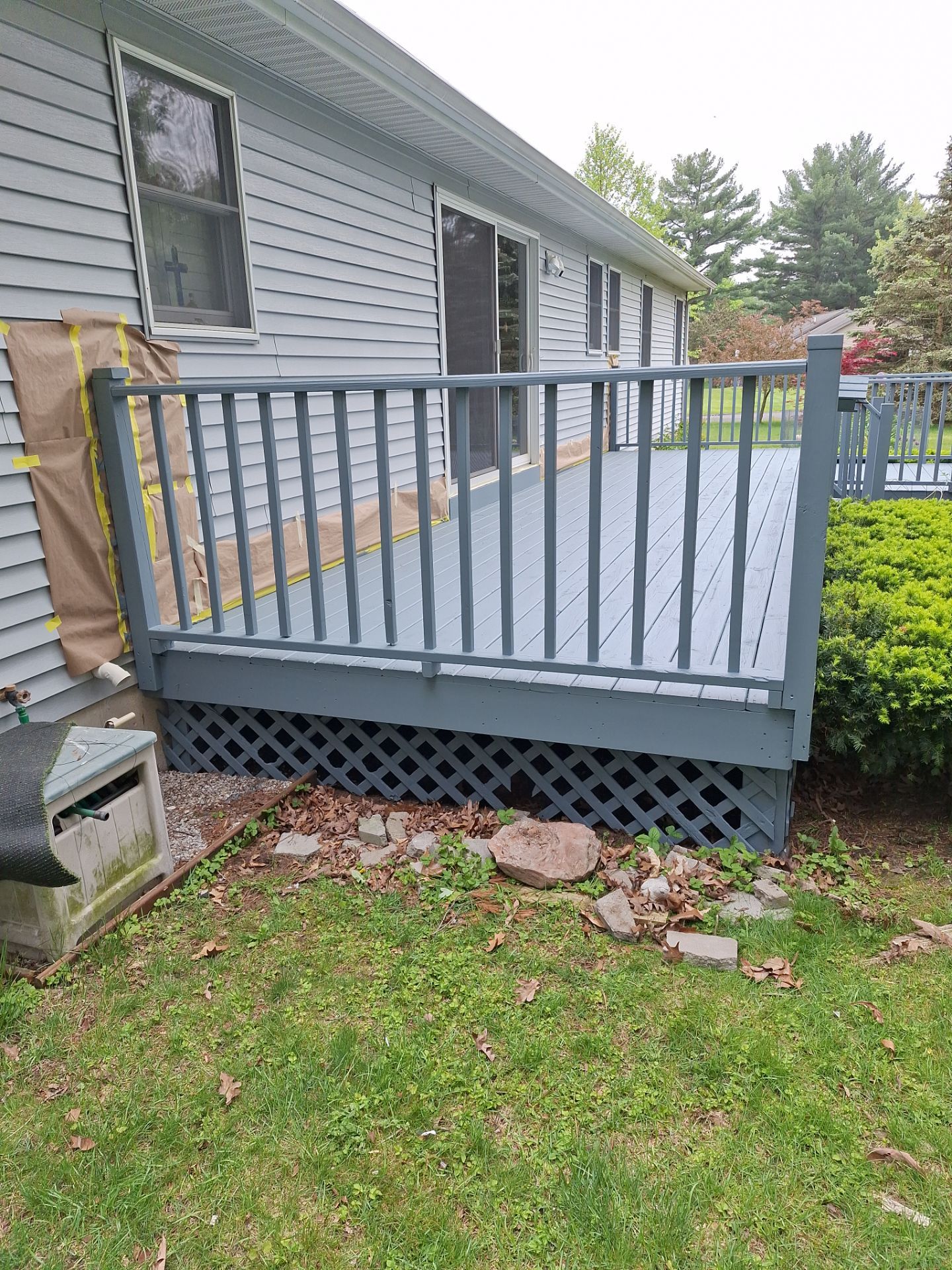Repaint bedroom furniture, Pergola, and doors. Stain decking by Gordon Painting