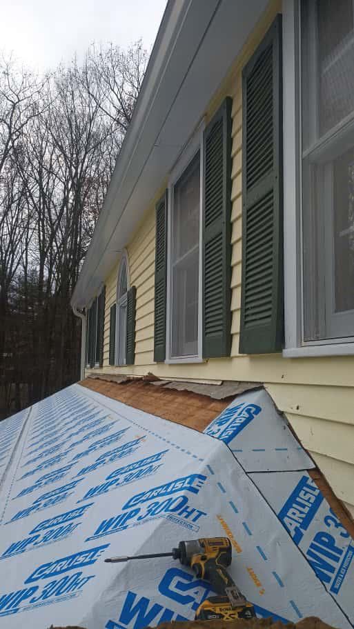 Chelmsford Premium Roof: Onyx Black Shingles with Standing Seam Metal Porch by Mighty Dog Roofing of Greater Middlesex County