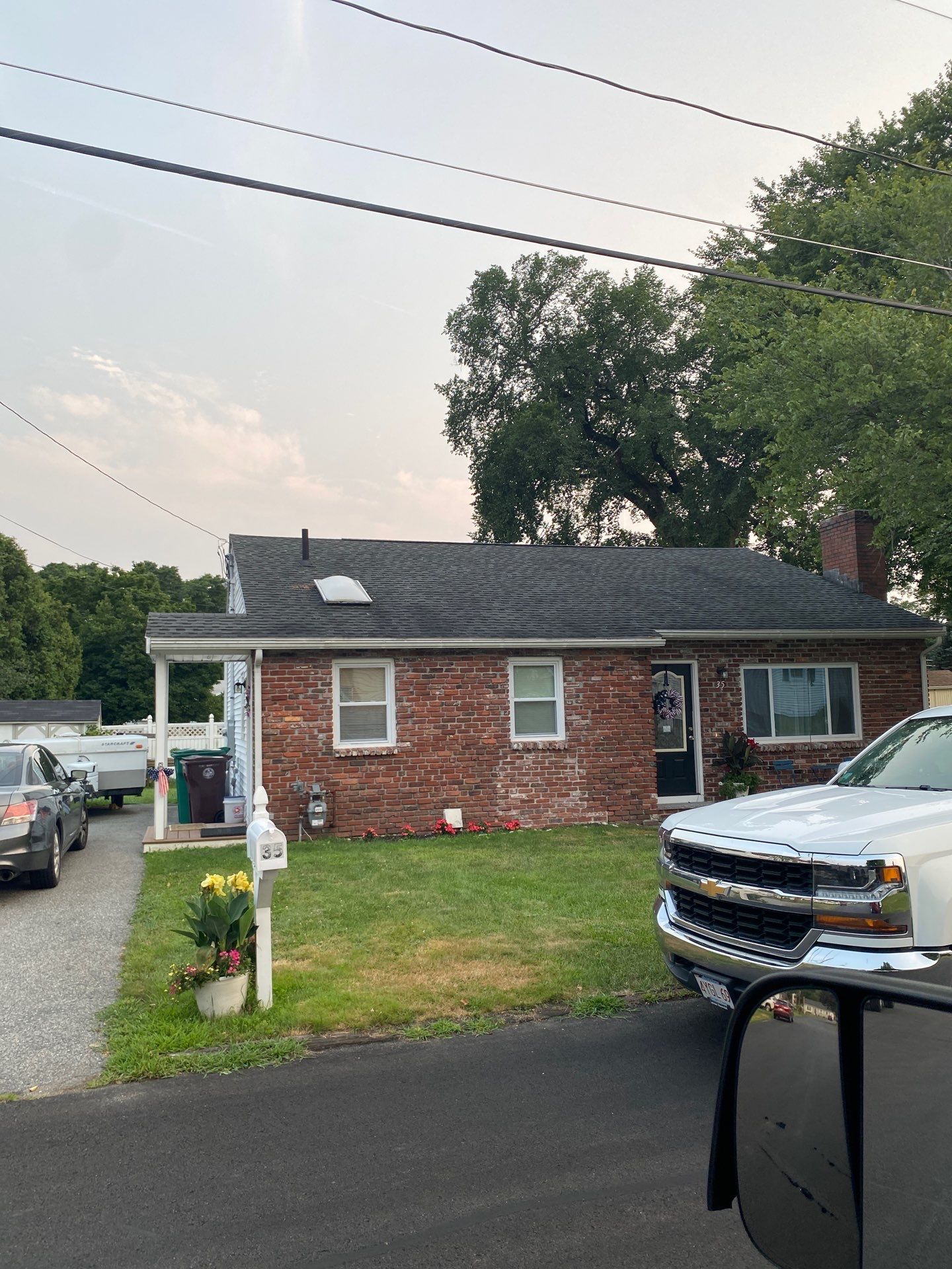 Lowell Premium Velux Curb-Mount Skylight & Chimney Restoration by Mighty Dog Roofing of Greater Middlesex County
