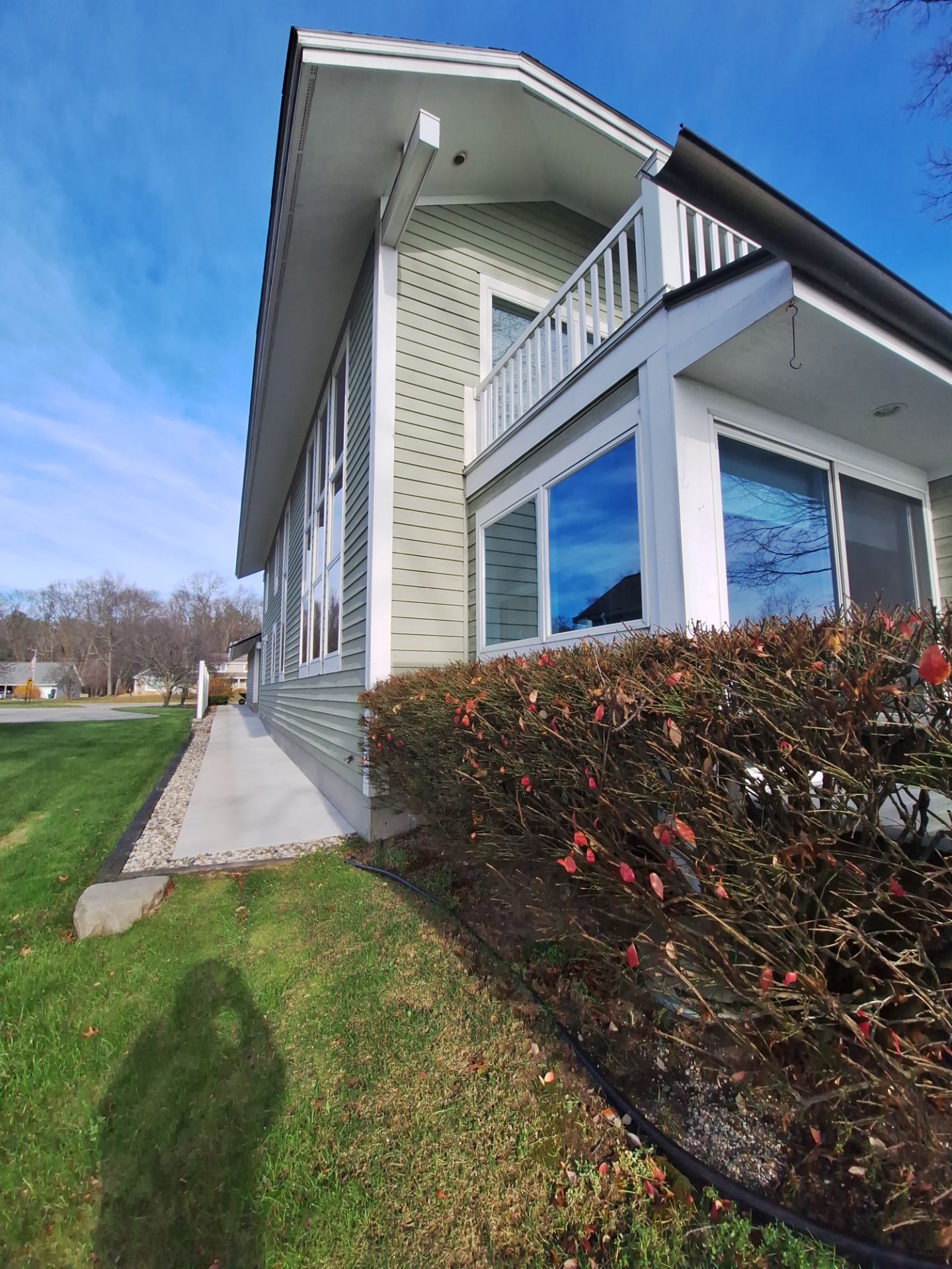 Full Exterior Painting and Trim Restoration for Muskegon Residence by Gordon Painting