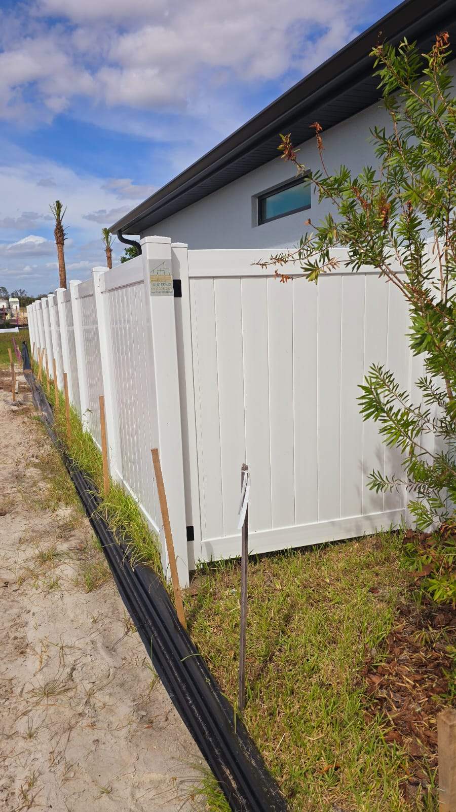 White Vinyl Privacy Fence Installation for North Port Residential Property by True Fence LLC