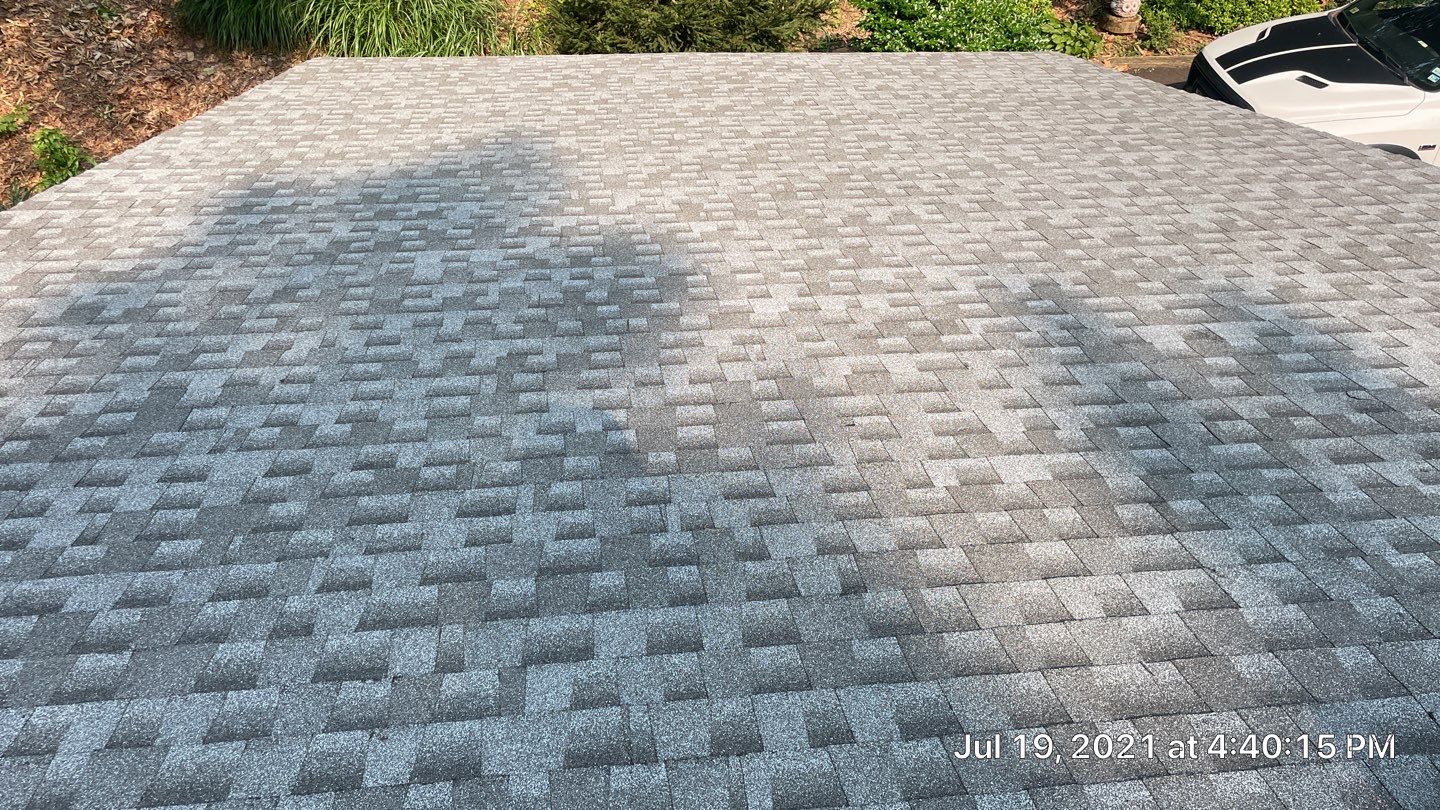 Deckhouse Roof Replacement by American Home Contractors