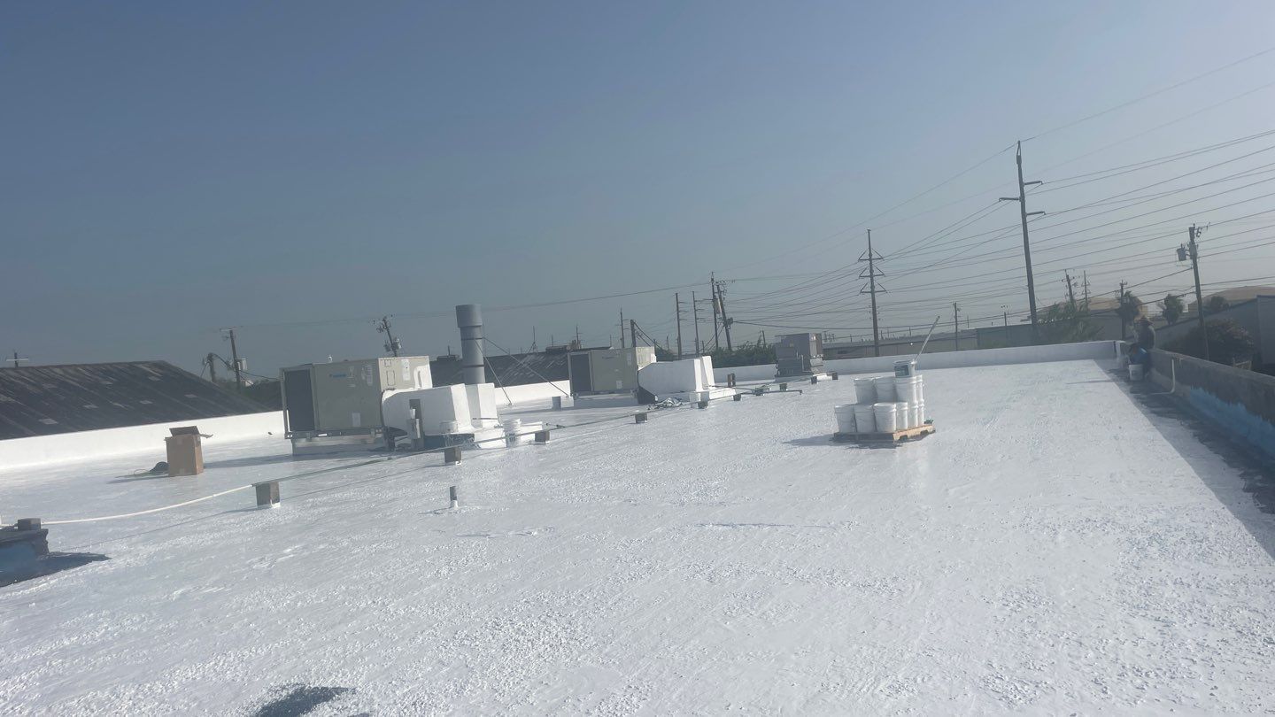 Dirty leaking Gravel Roof by Bayfront Roofing and Construction