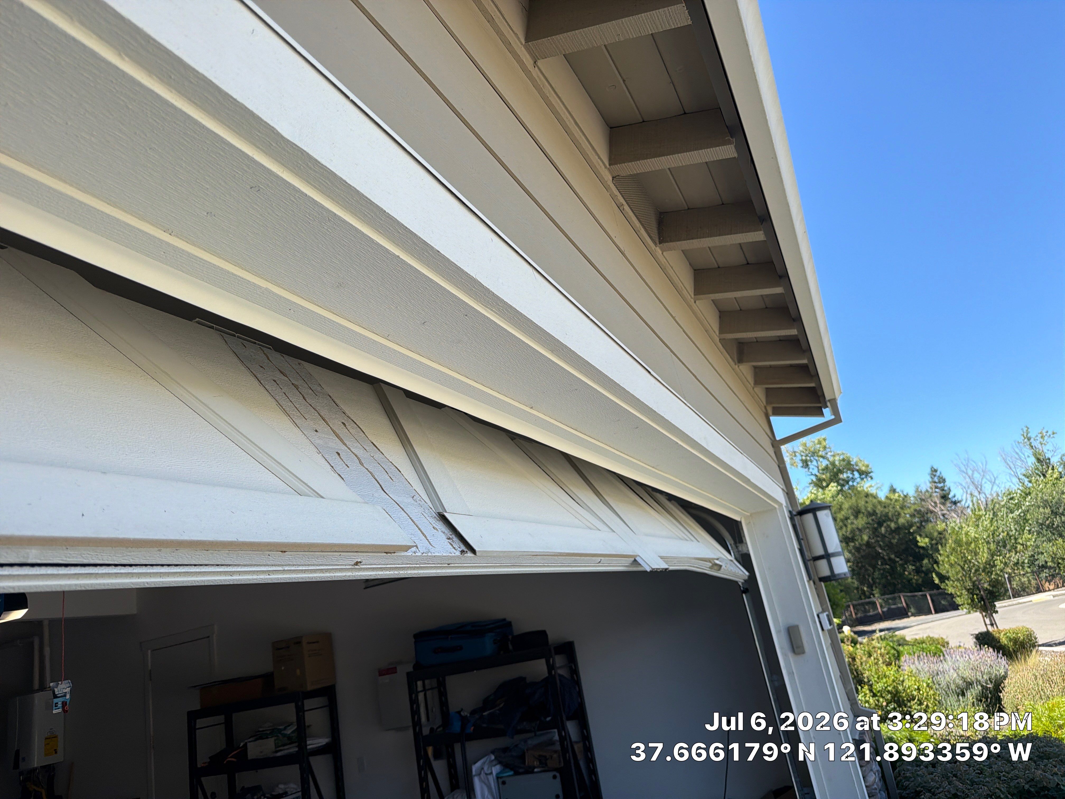 White Carriage-Style Garage Door Installation with Decorative Windows in Pleasanton by Valiant Garage Door