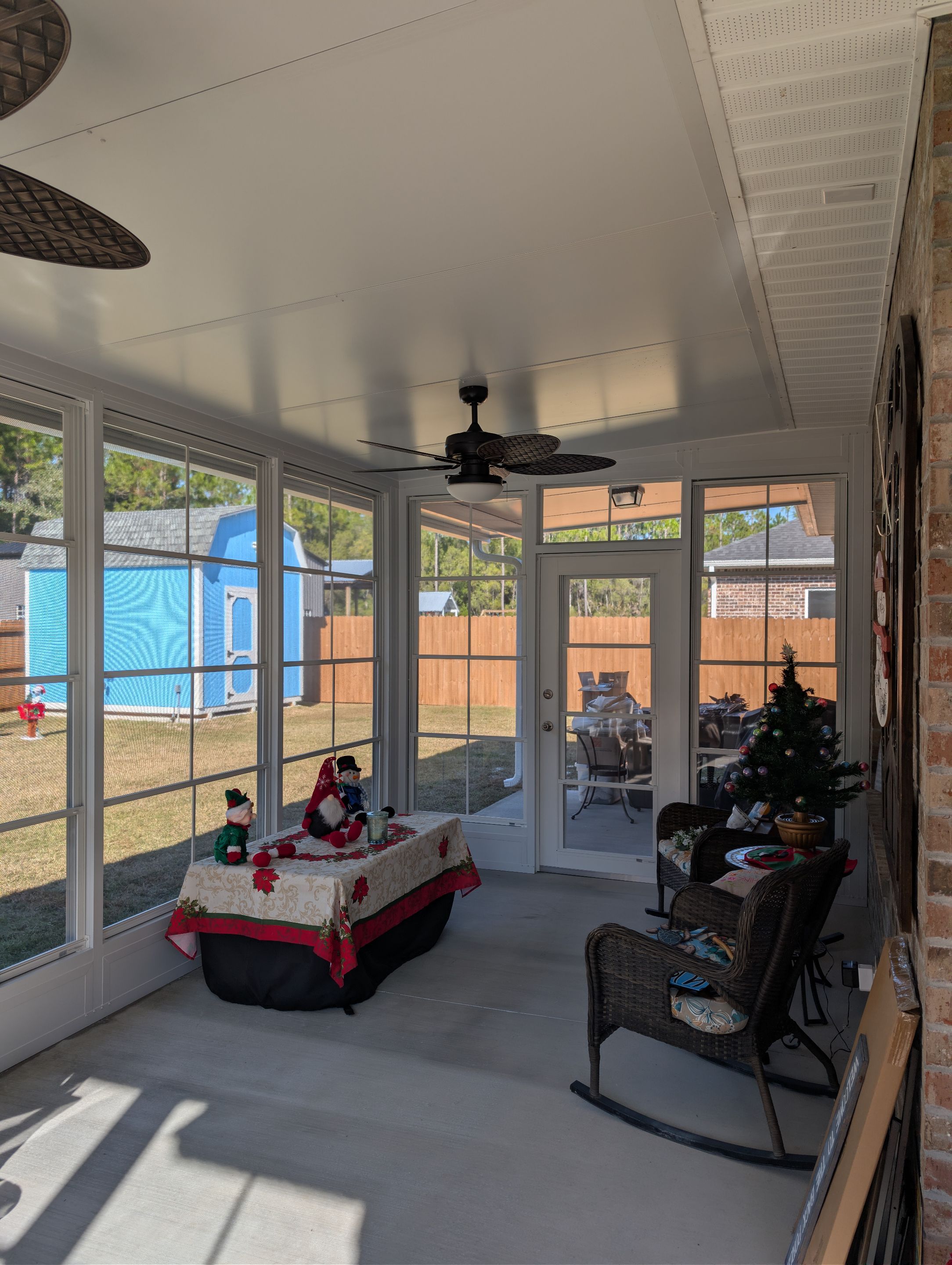 Home addition w/Vinyl 4-Track Windows by Titan Sunrooms