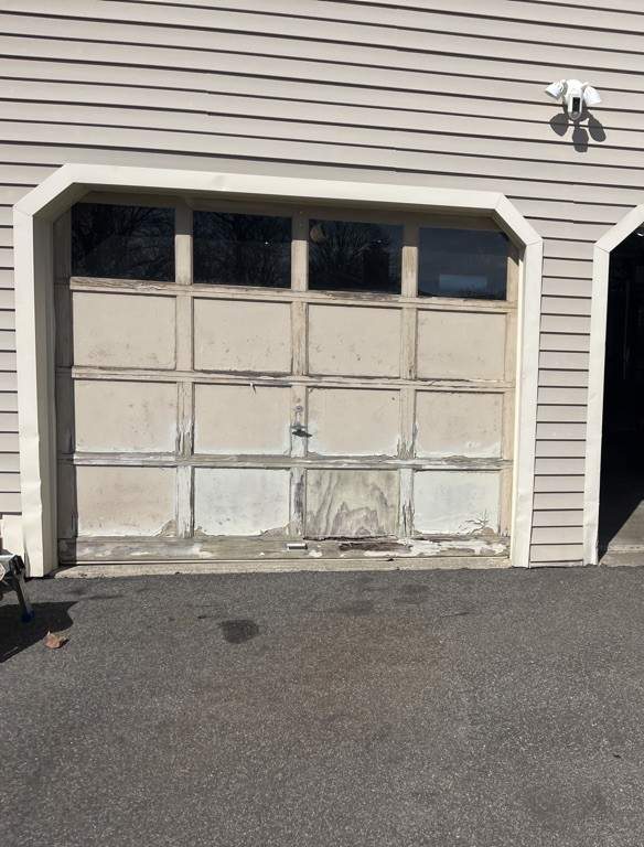Garage Door Installation using Amarr Designer Choice door by DiGiorgi Roofing and Siding Inc