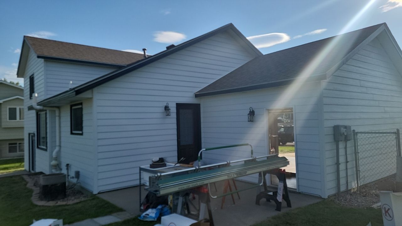 New and Improved Siding by Weather-Tite Exteriors LLC