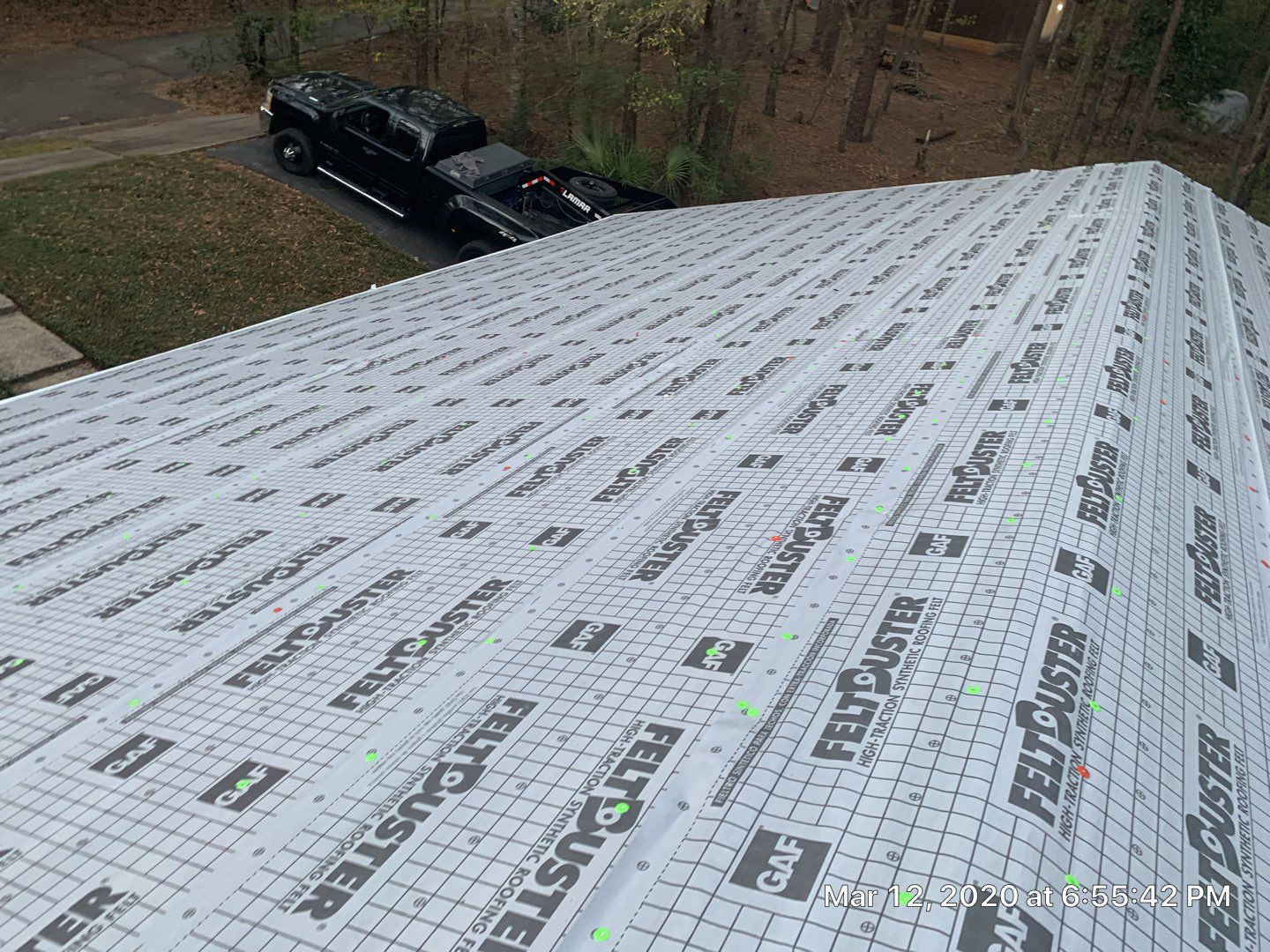Residential Roofing Installation using Roof Replacement by American Roofing & Construction LLC