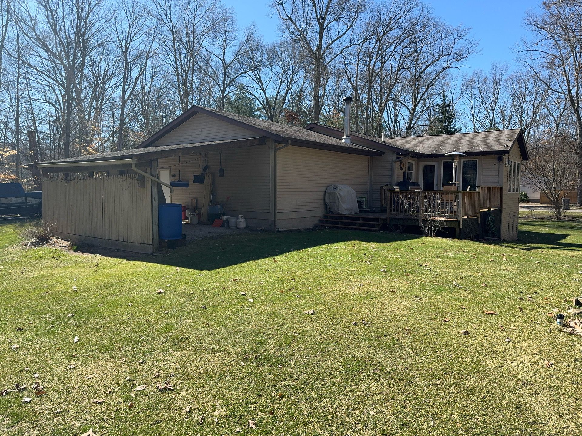 Siding, Deck and Versetta Stone by Avalon Roofing and Exteriors