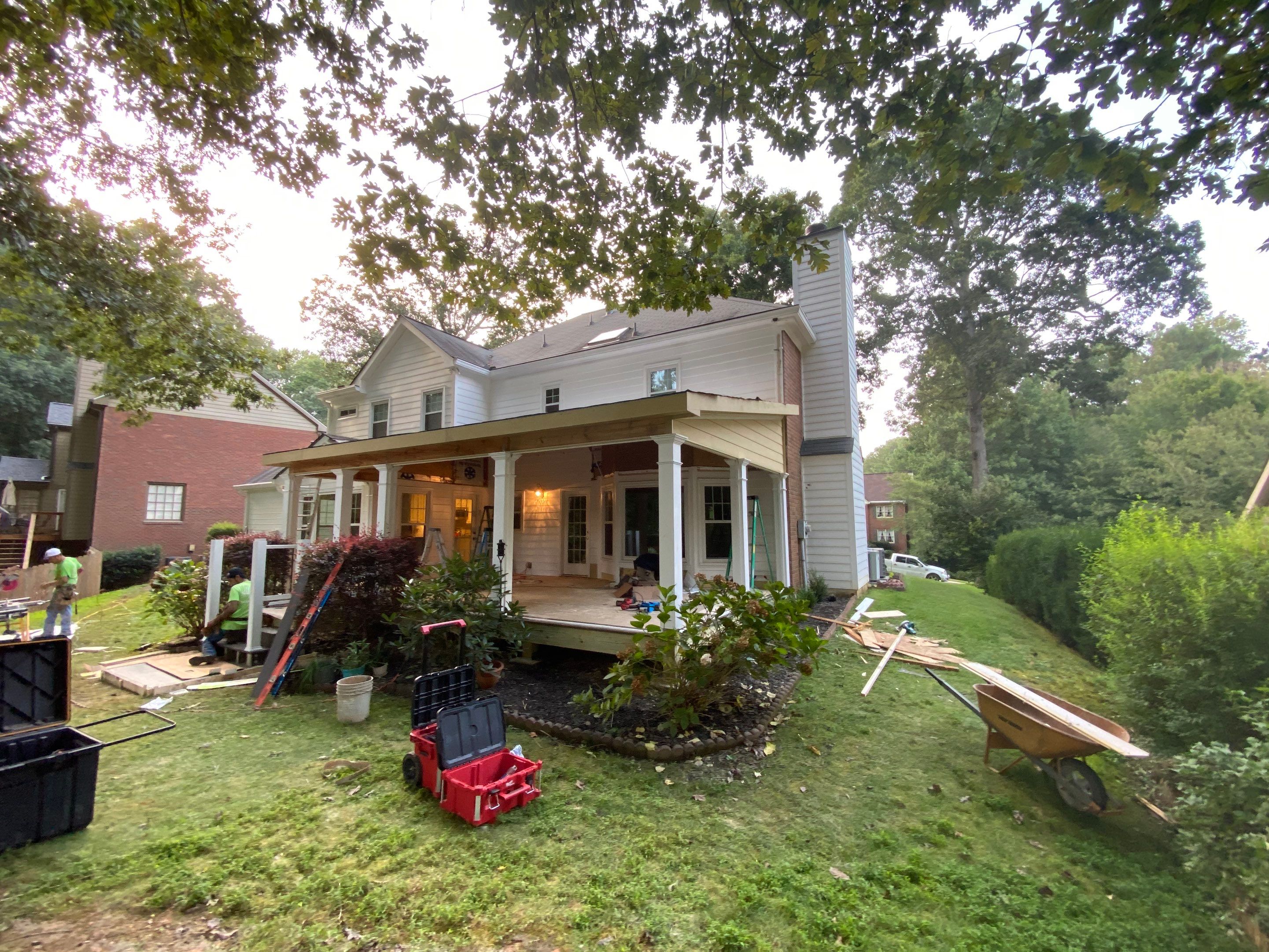 Custom Screened Porch with Beadboard Ceiling and Composite Decking by Swift Home Renovations