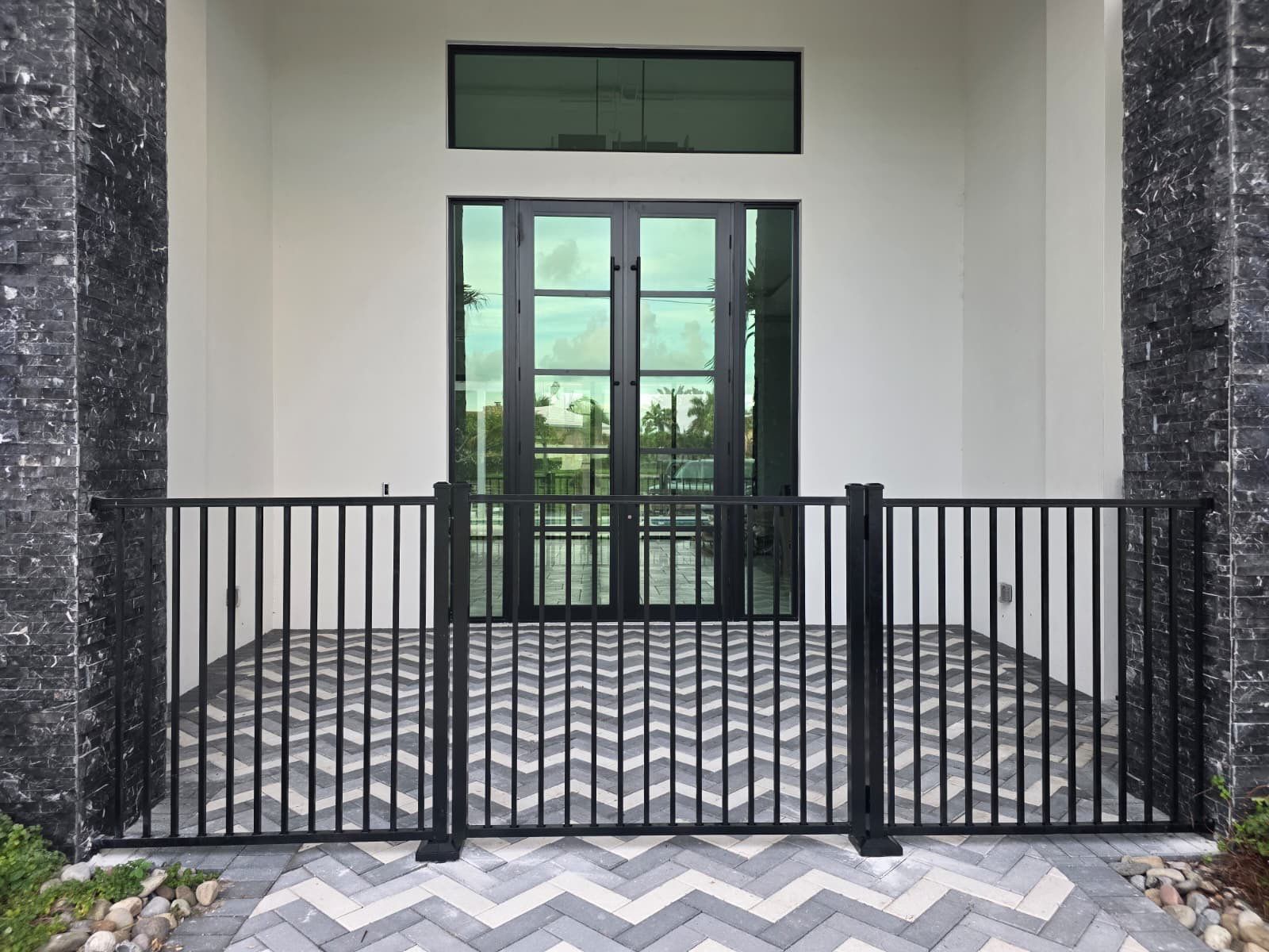 Marco Island Waterfront Vinyl Privacy Fence and Aluminum Railing by True Fence LLC