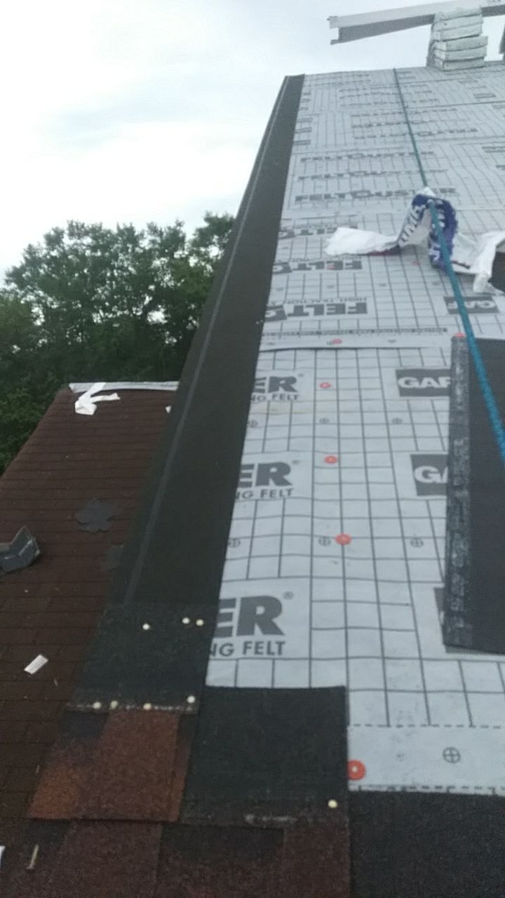 Residential Roofing Installation using Roof Replacement by American Roofing & Construction LLC