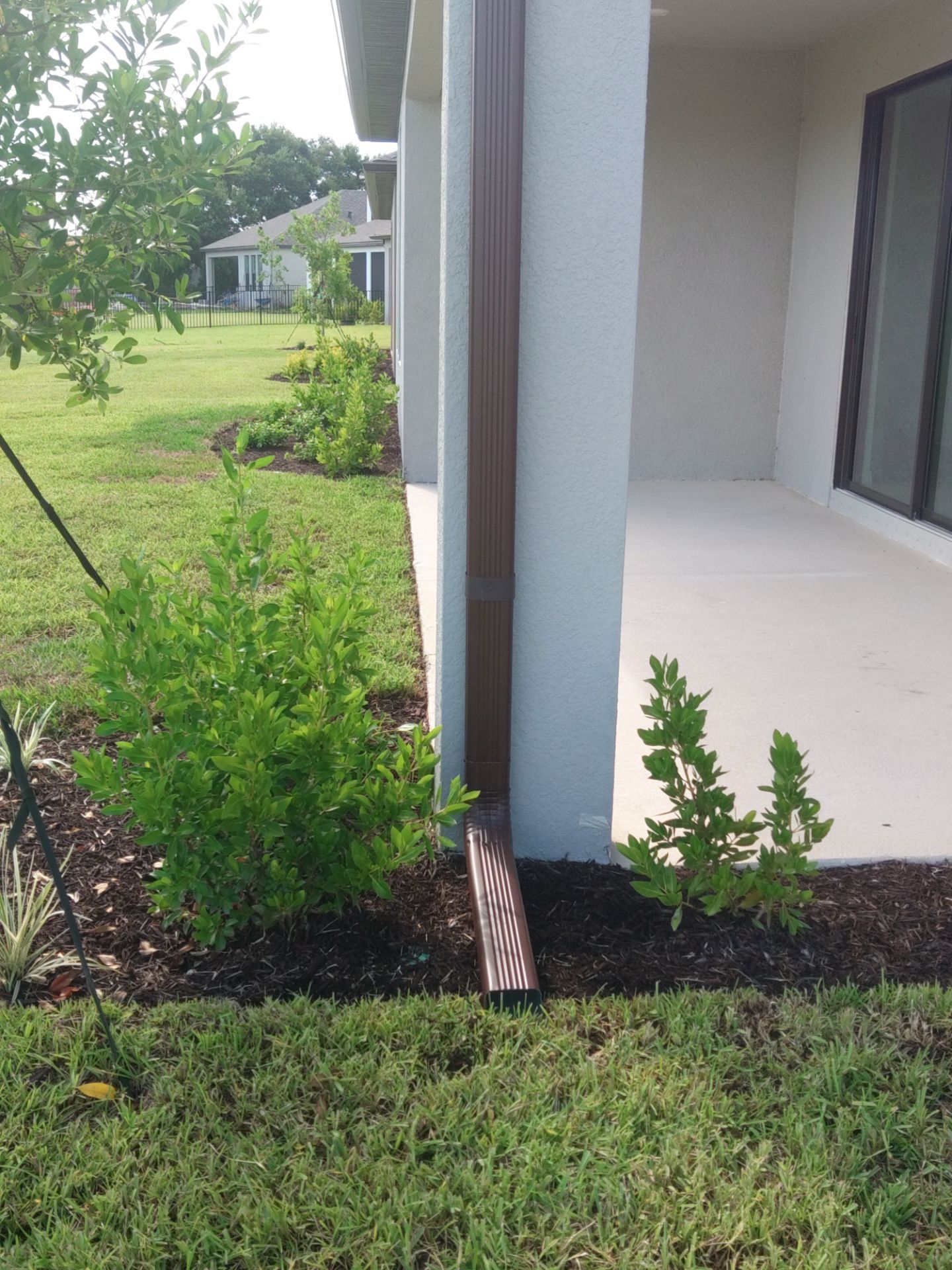 Musket Brown Seamless Gutters using Musket Brown Seamless Gutters in Nokomis FL by Gutter Professors
