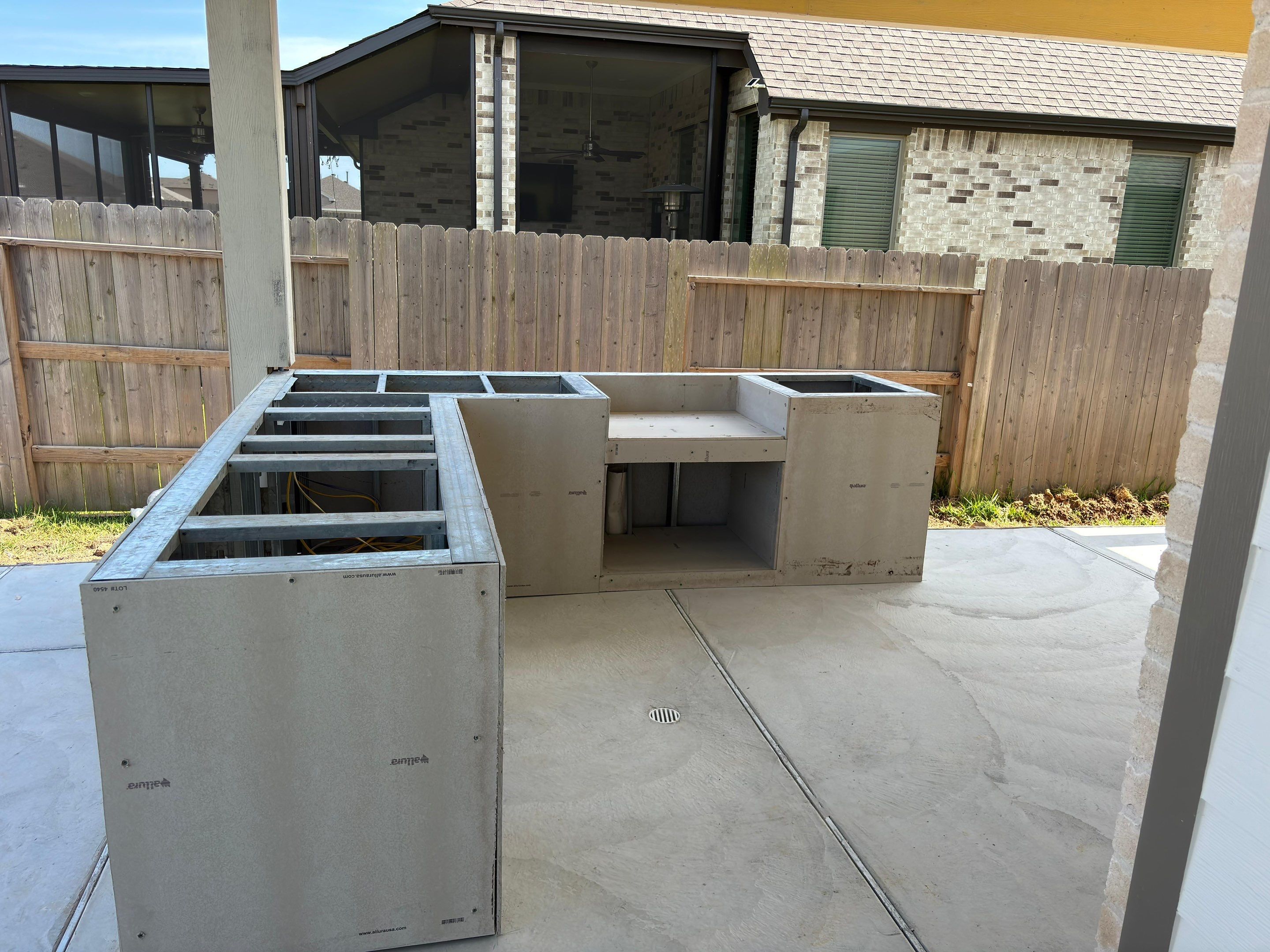 Patio and Summer Kitchen in Texas city by SophAlx LLC