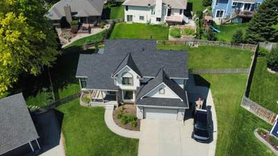 Residential Roofing Installation using IKO Nordic Glacier Impact Resistant Class 4