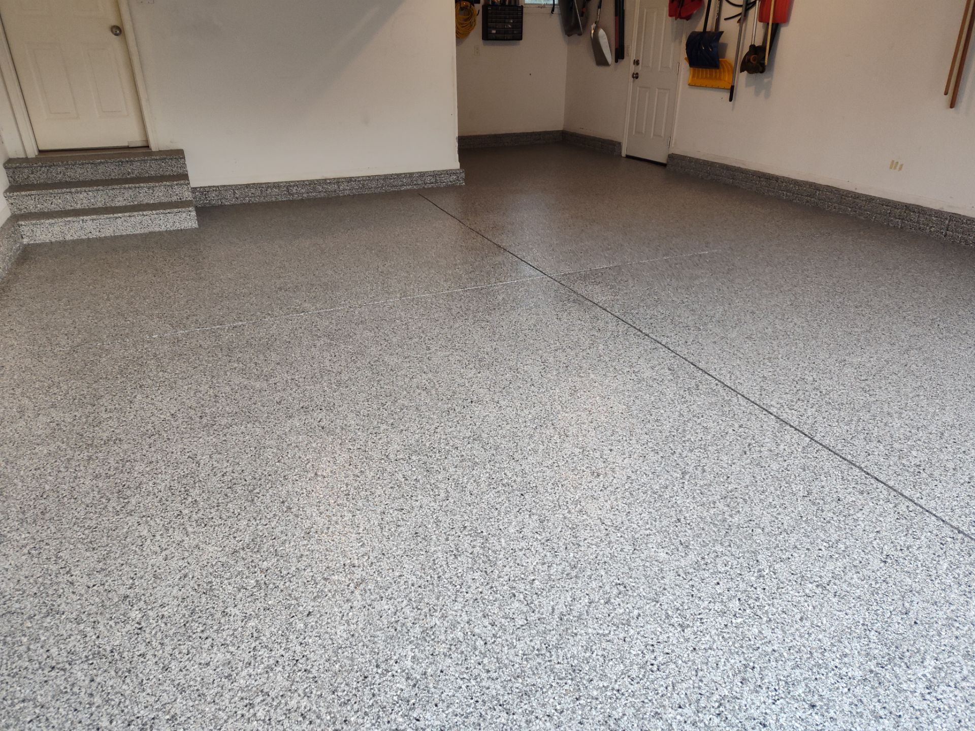 A Garage In One Day Keeps the Rock Salt Away! by Revival Concrete Coatings, LLC