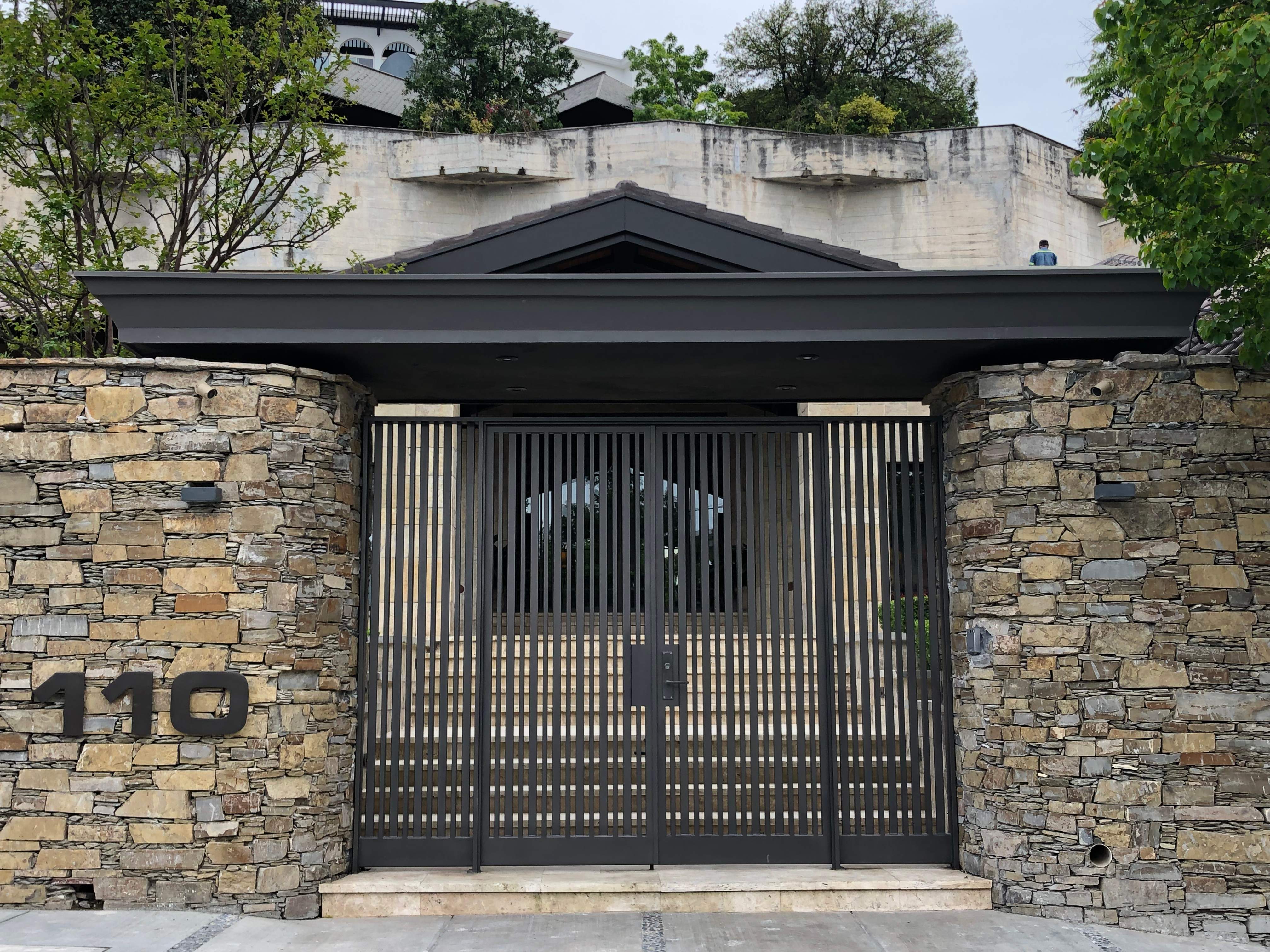 Custom Stone Entryway and Secure Perimeter Gate Installation in Monterrey by Solara Custom Living