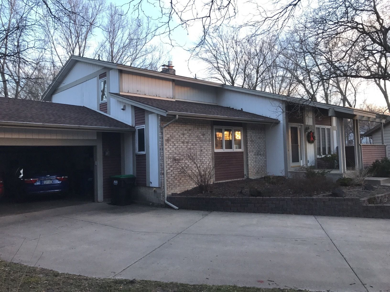 Siding Installation using LP SmartSide and Pella Vinyl Windows by MODERN EXTERIOR SYSTEMS