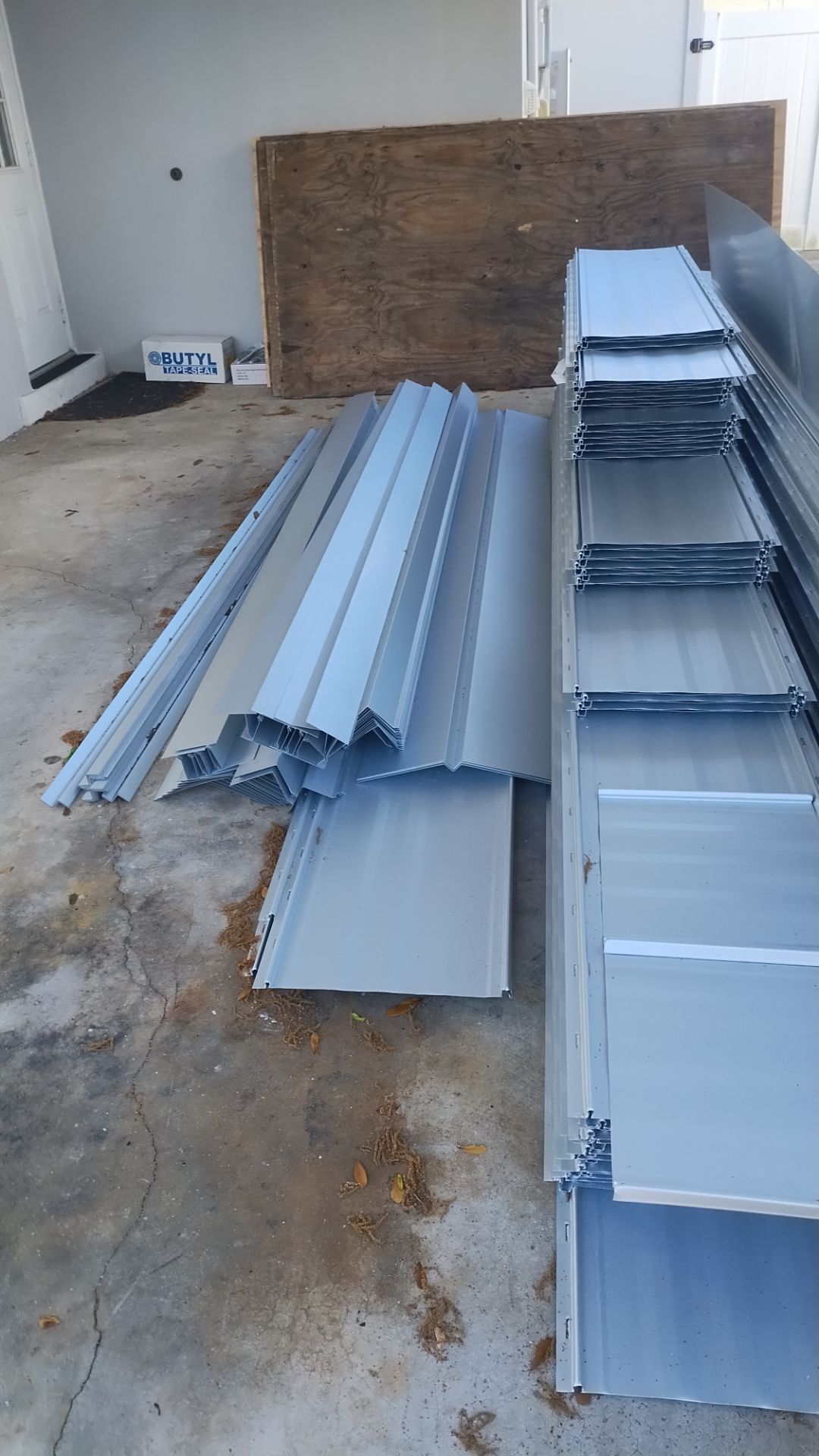 Residential Roofing Installation using 1" Nail strip metal roof by BLUES BROTHERS ROOFING