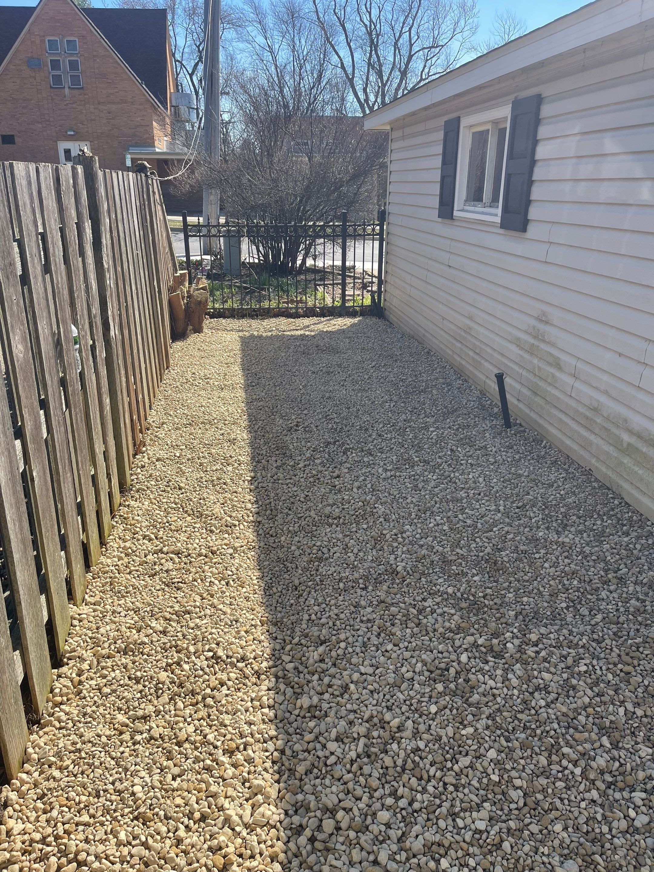 Rock Installation behind garage  by A&N 