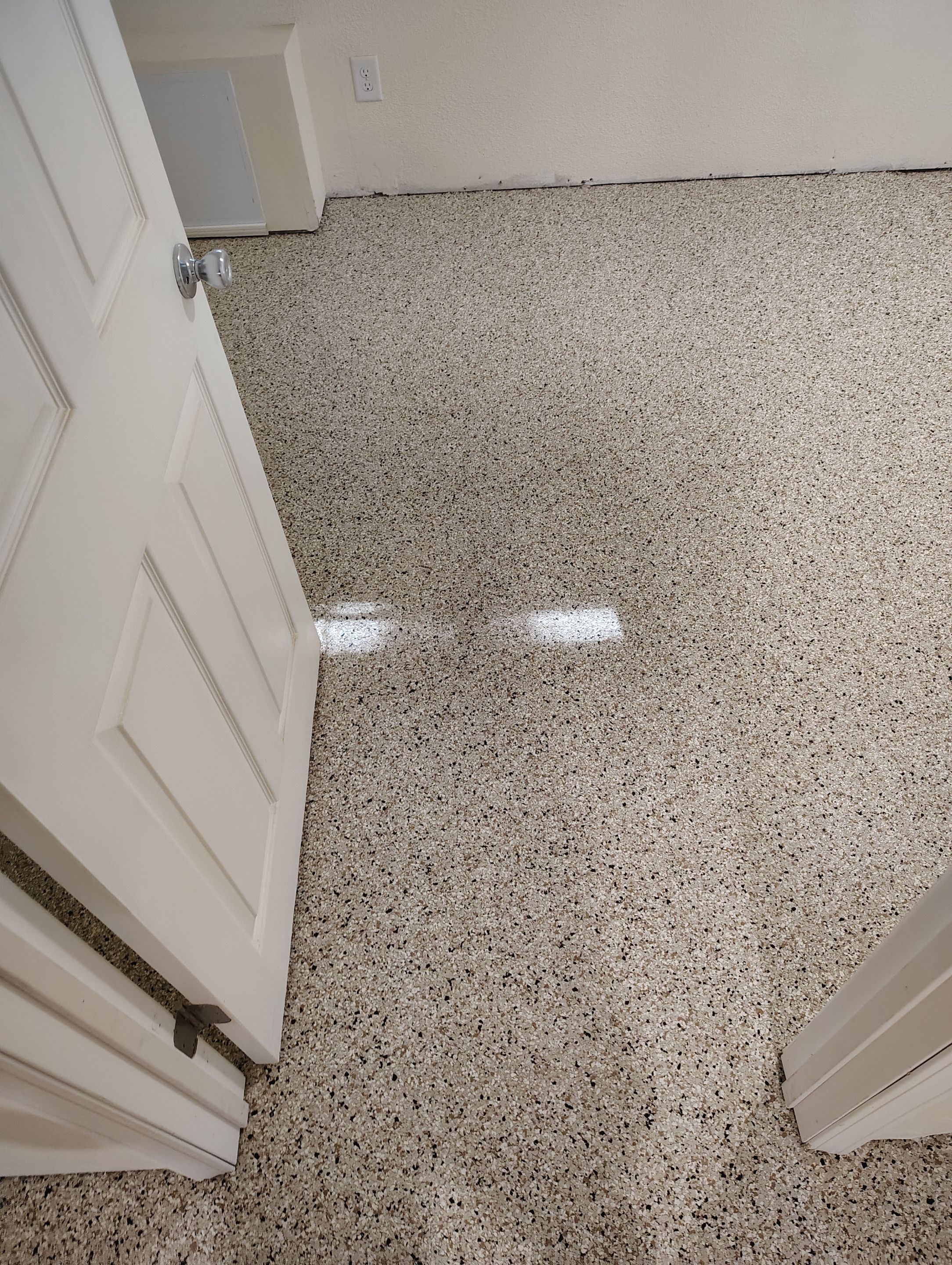 Comprehensive Basement Concrete Floor Coating and Crack Repair in Sioux Falls by Select Painting, Coatings & Garage Cabinets