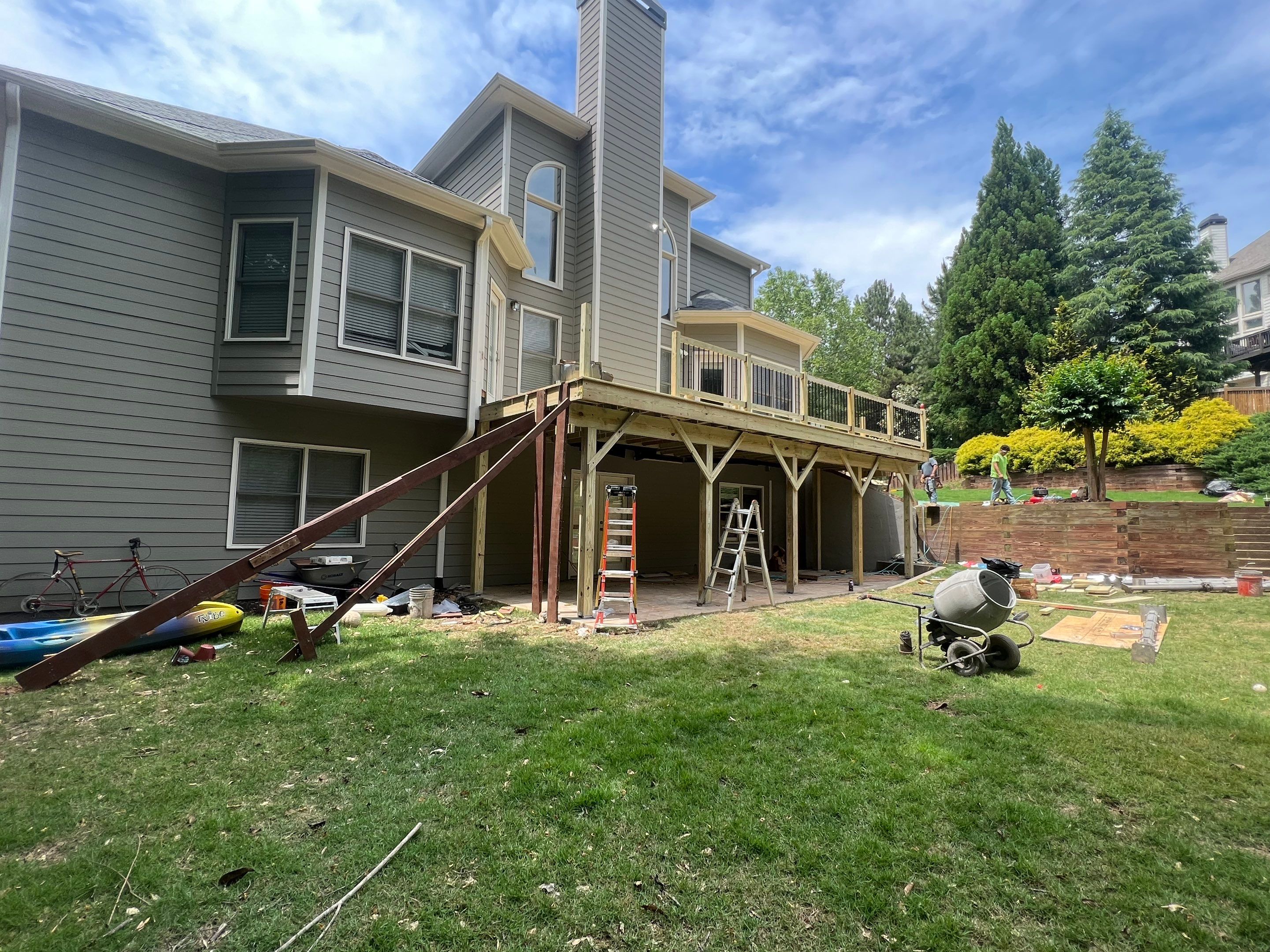Elevated Wood Deck Replacement and Staircase Installation in Woodstock by Swift Home Renovations