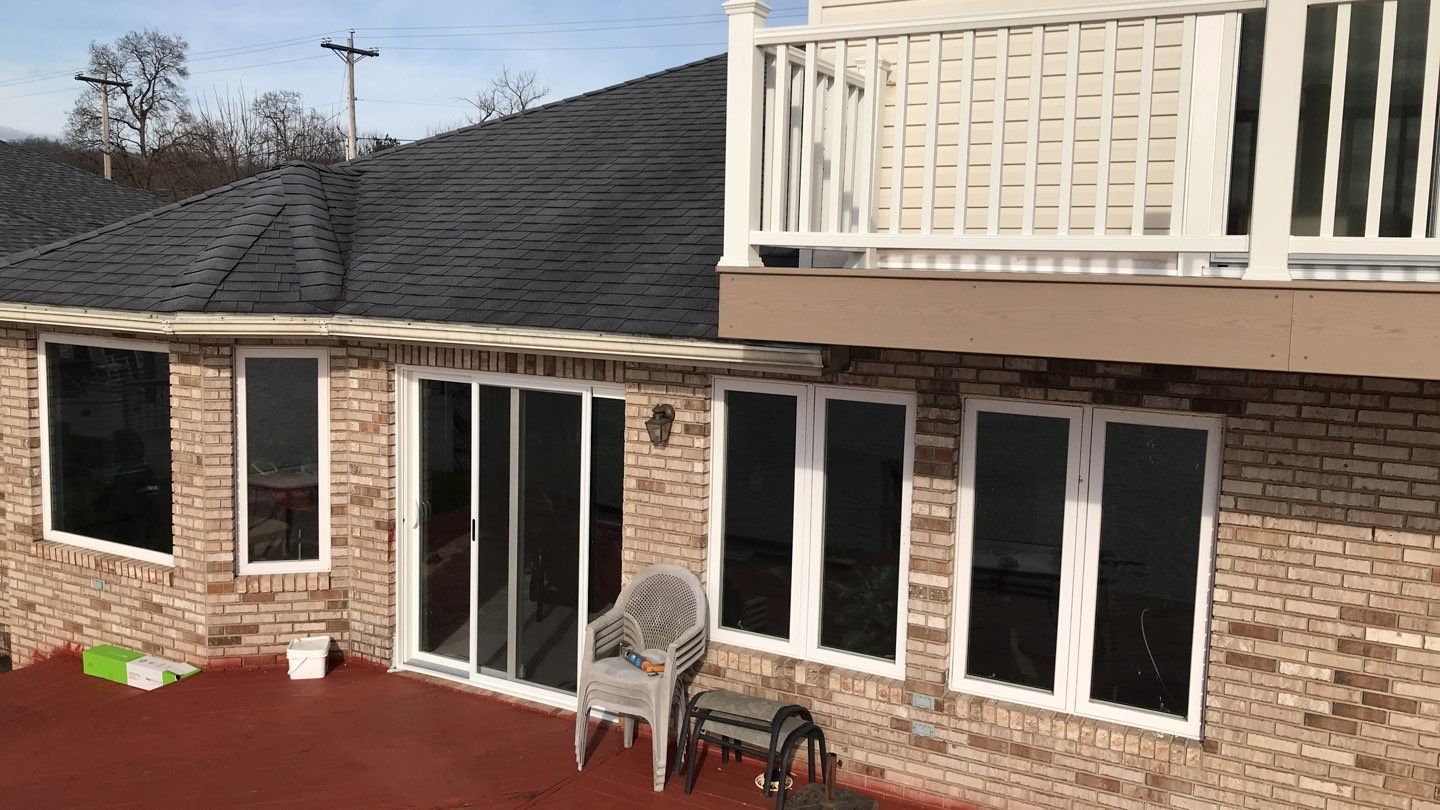 Deck Refurbush and Door Replacement using Trex Decking and Railing. Polaris Patio Doors by Secure Construction Company Inc