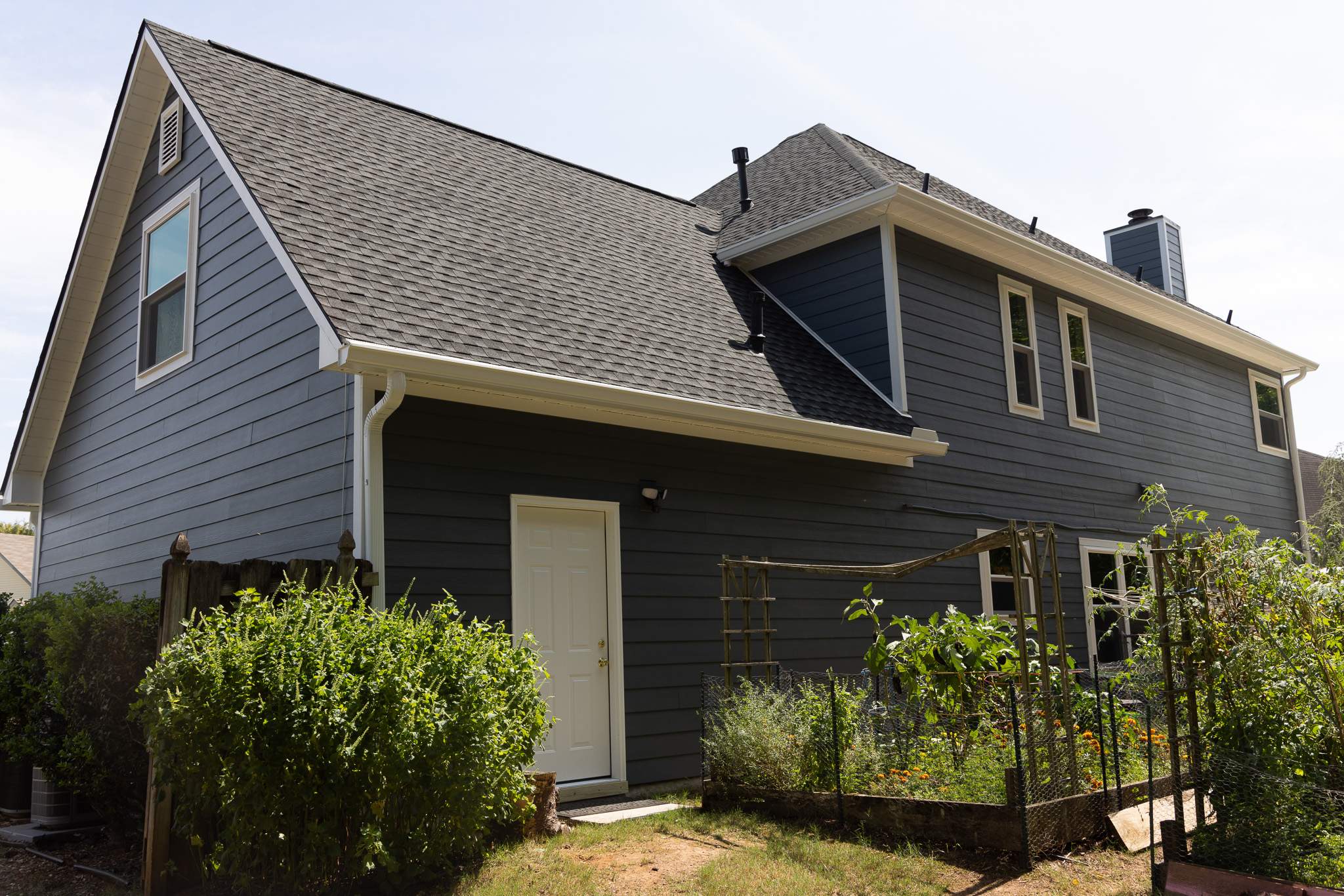 Evening Blue Hardie + Windows by Freedom Exteriors