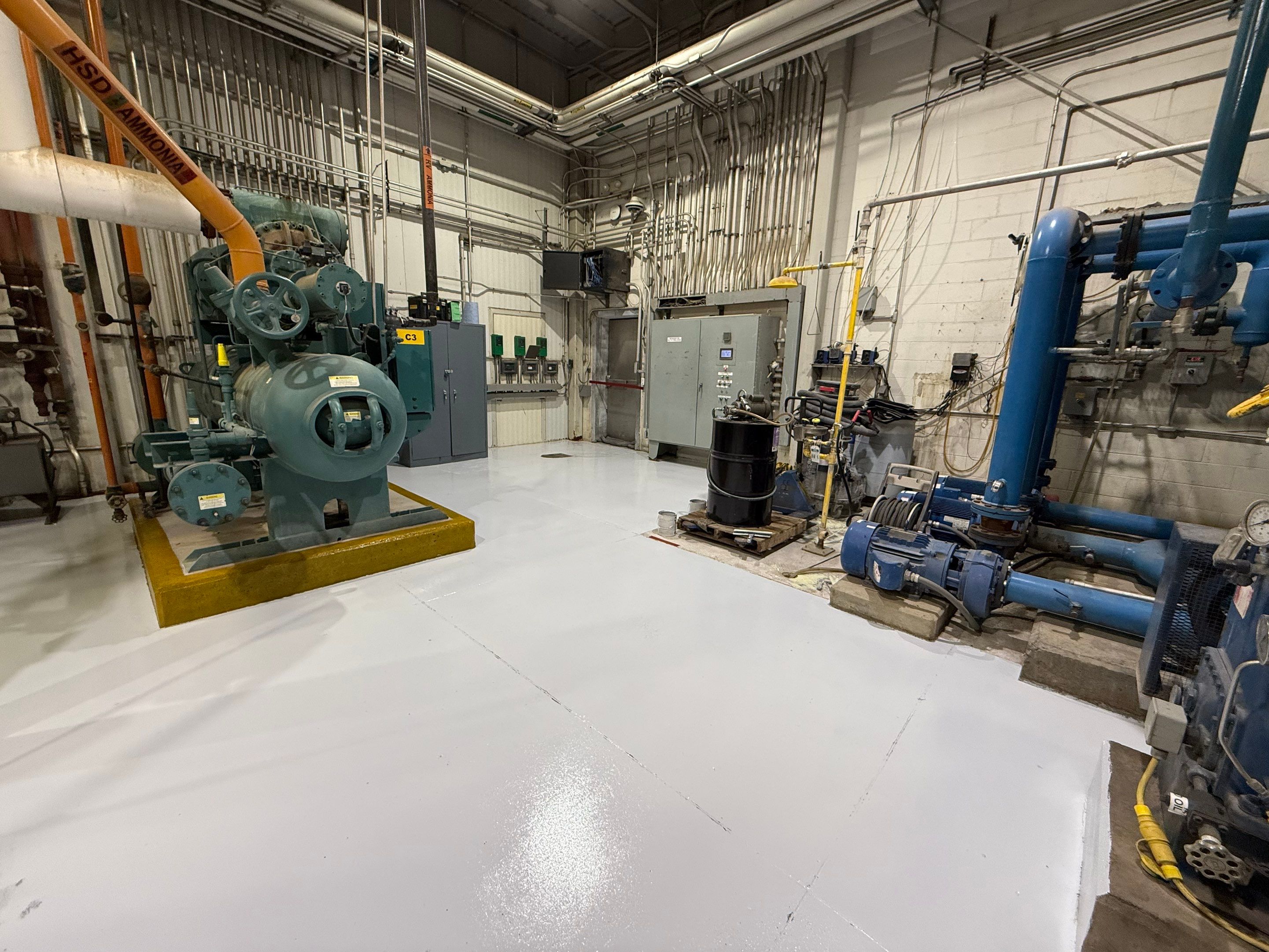 Industrial Epoxy Floor Coating for Perdue Premium Meat Co in Sioux Center by Select Painting, Coatings & Garage Cabinets