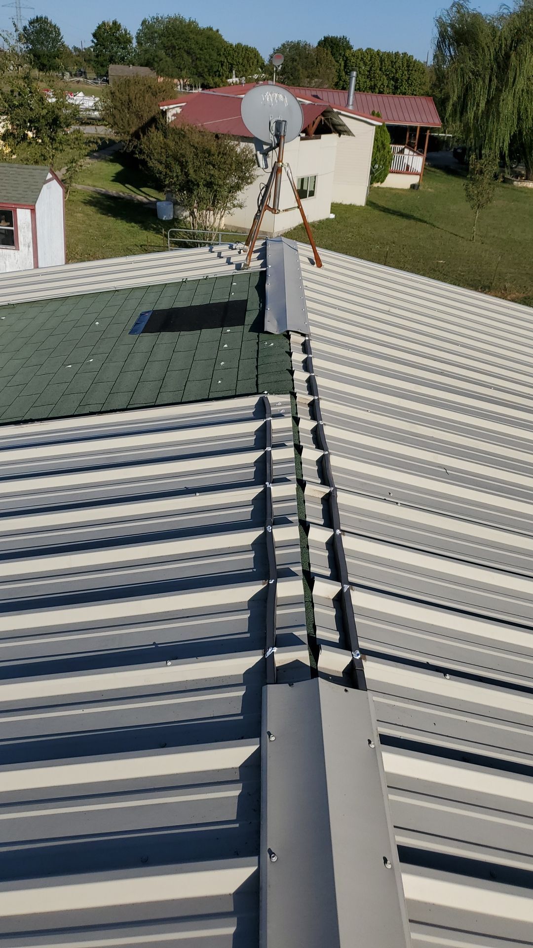 Residential Roofing Repair using PBR Metal Roof by Harvey Roofing & Construction