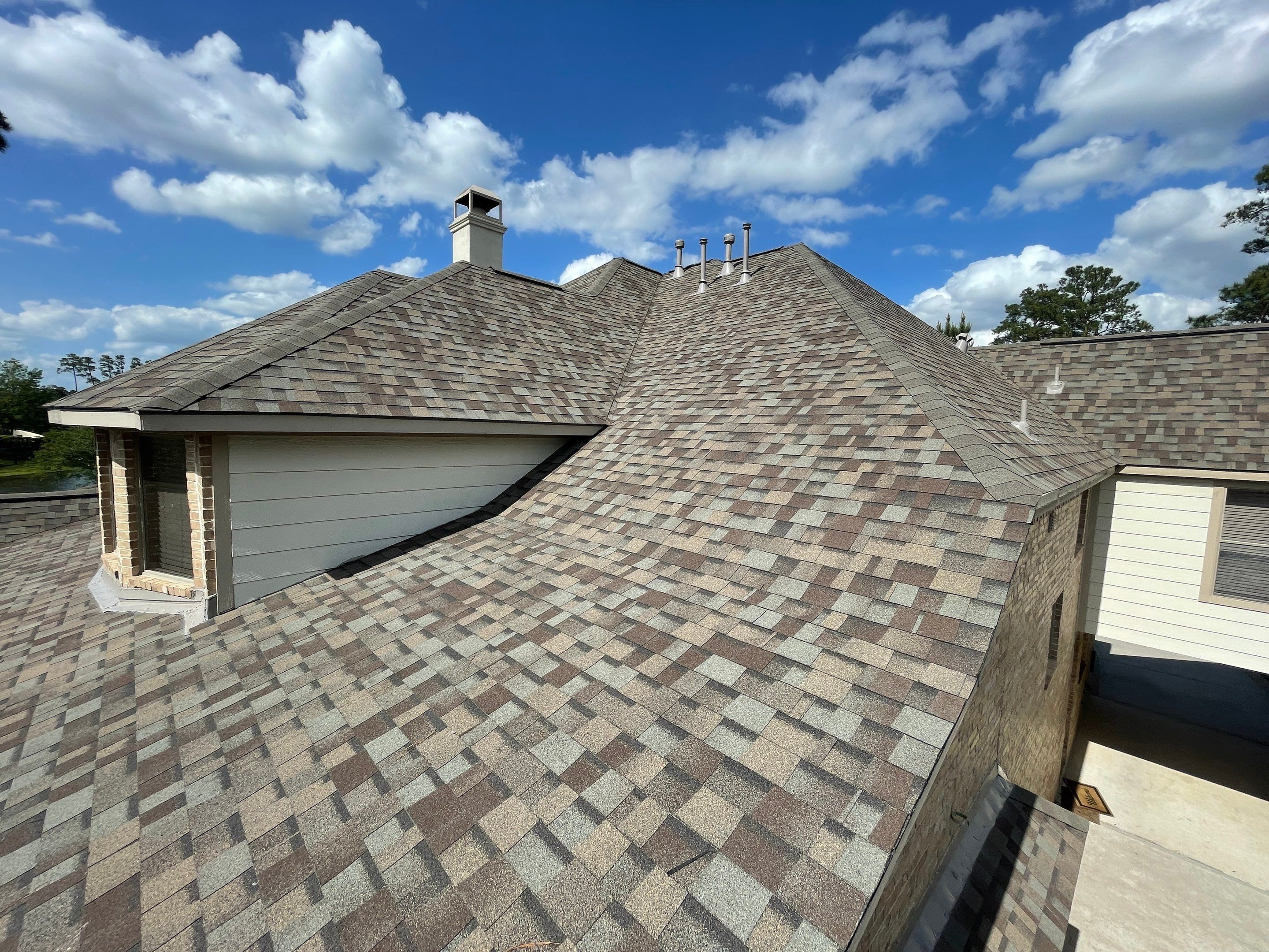 OC Duration Driftwood by HHH Roofing & Construction
