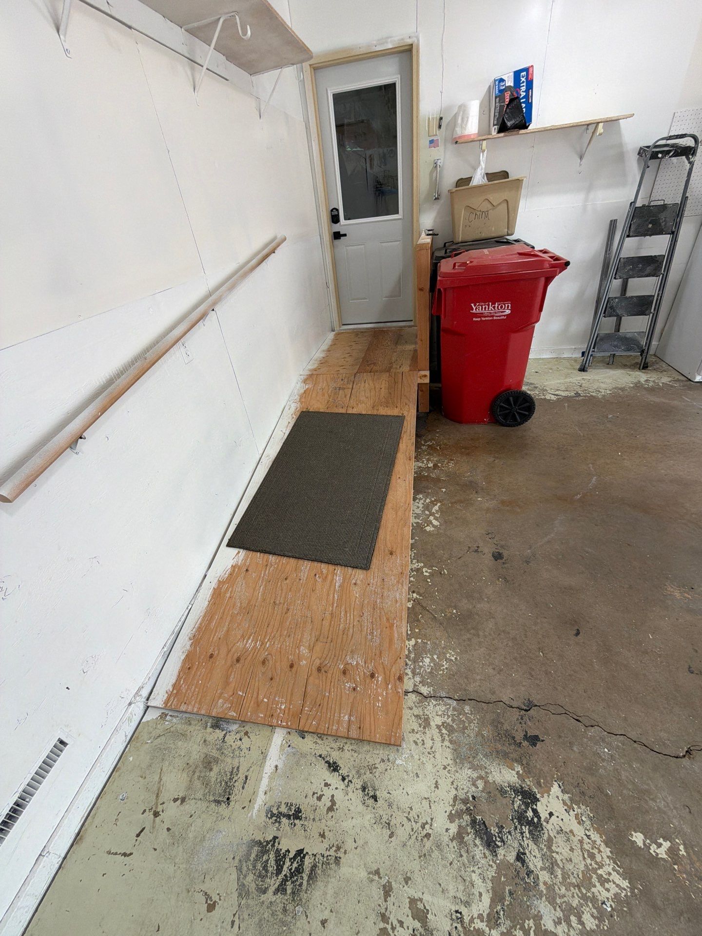 Yankton Garage Concrete Coating With Feather Gray Decorative Chips by Select Painting, Coatings & Garage Cabinets