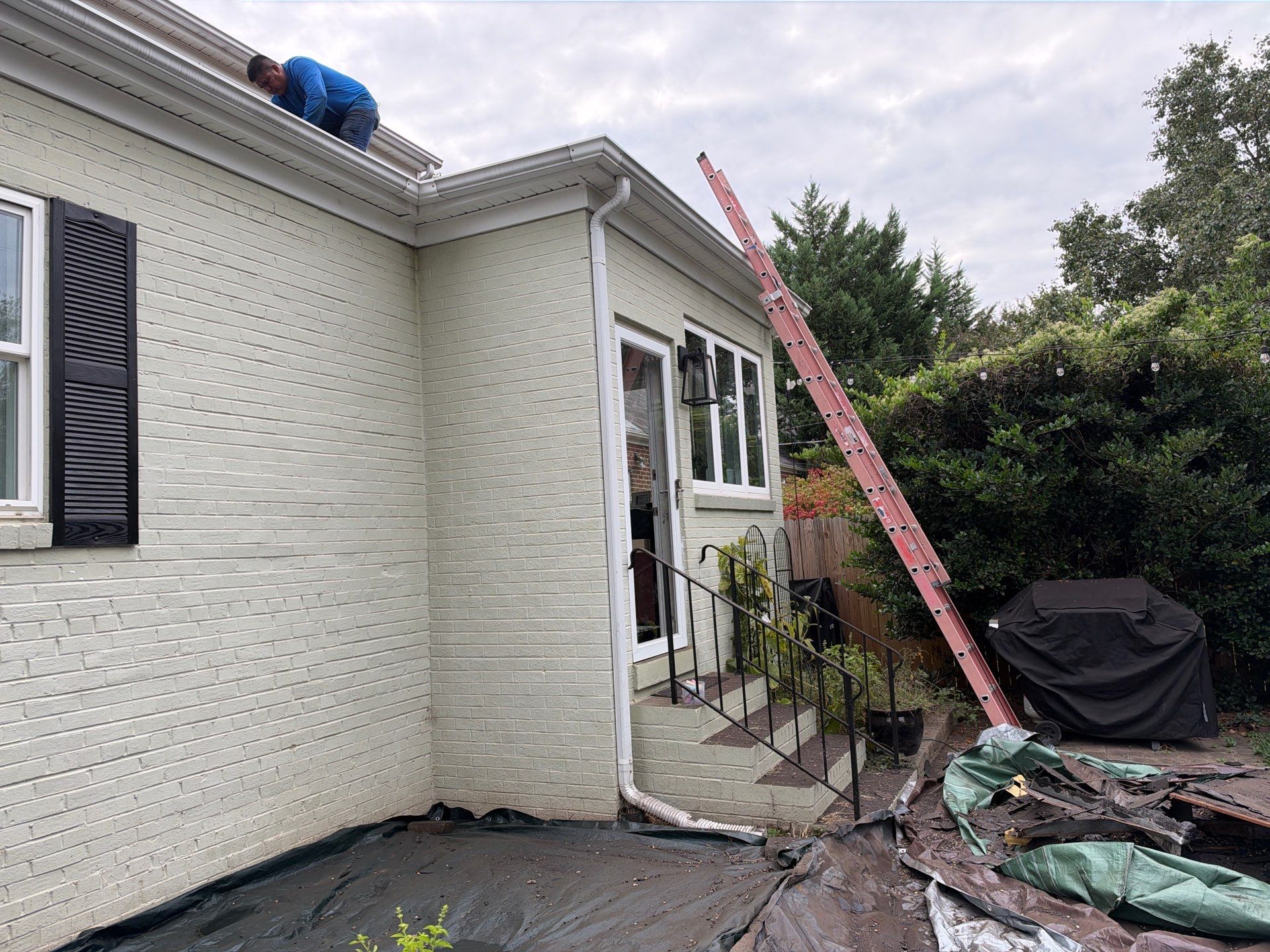Richmond Roof Replacement Including Flat Membrane and Asphalt Shingles by Cade Construction