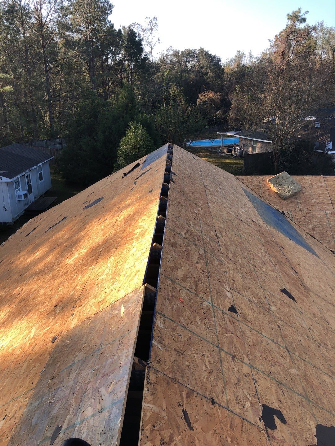 Residential Roofing Installation using Roof Replacement by American Roofing & Construction LLC