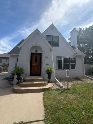 Exterior Stucco Painting and Trim Refresh in Sioux Falls