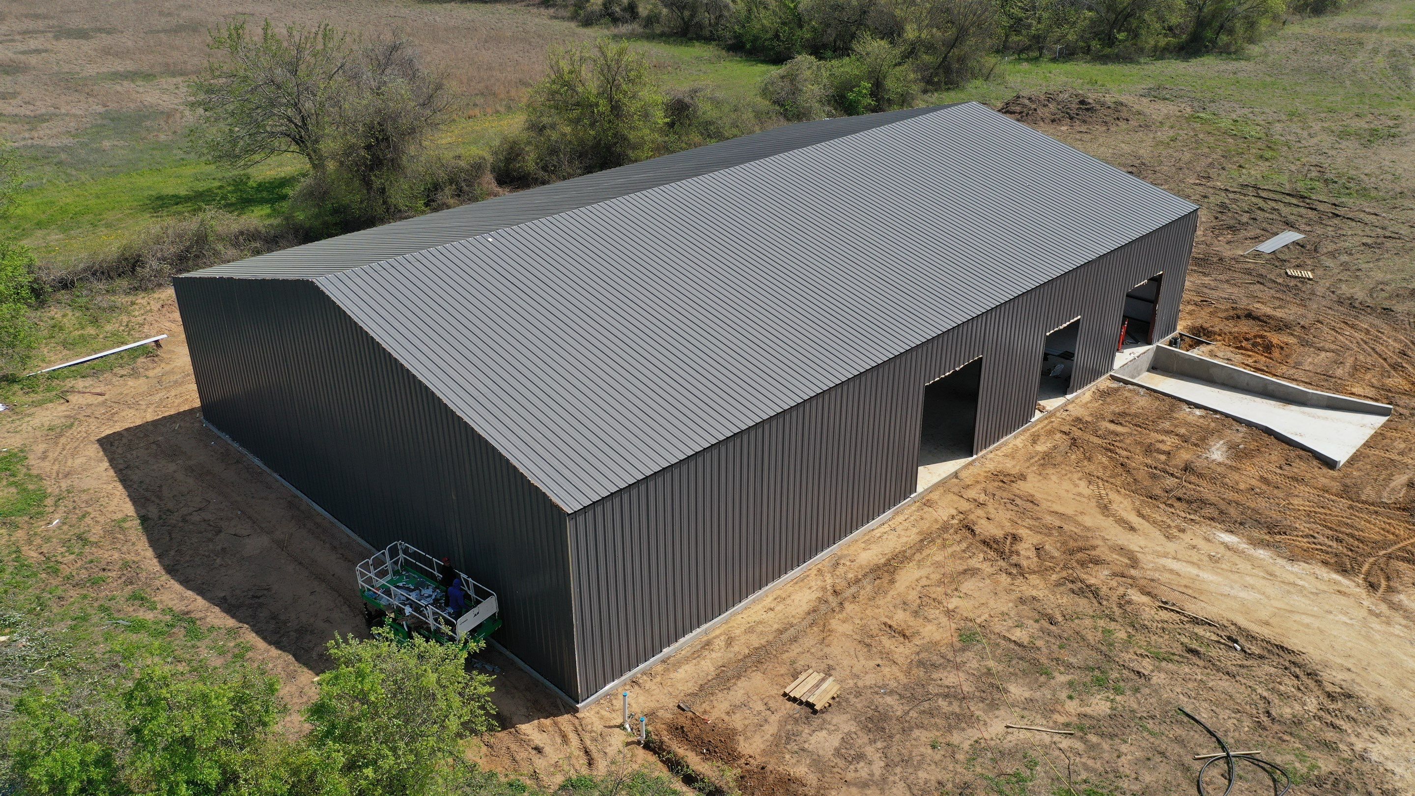 DYCHE INDUSTRIAL SERVICES metal building by Sky Roofing and Remodeling LLC