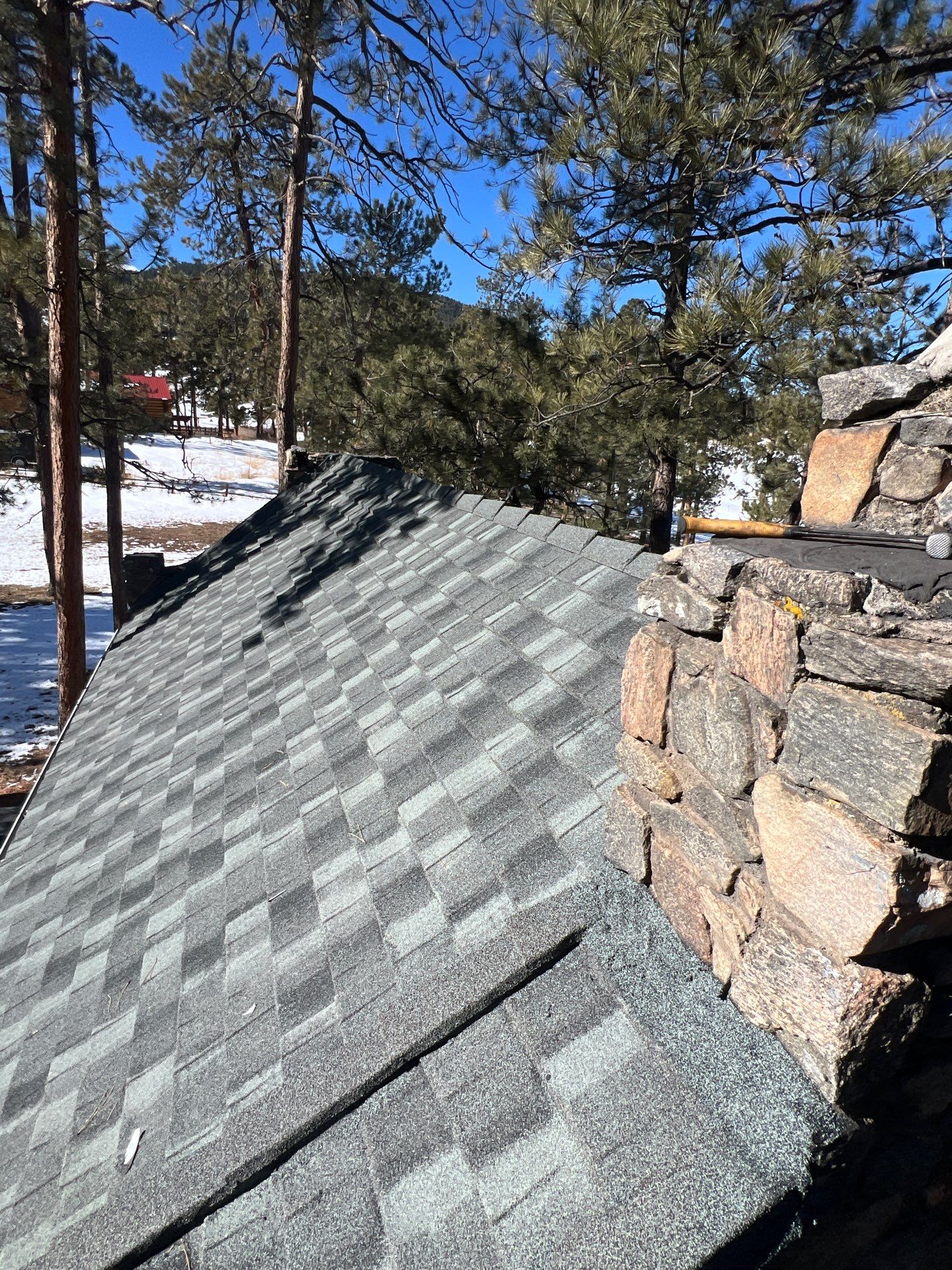 Residential Roofing Installation using Stone Coated Steel by Blue Peaks Roofing LLC 