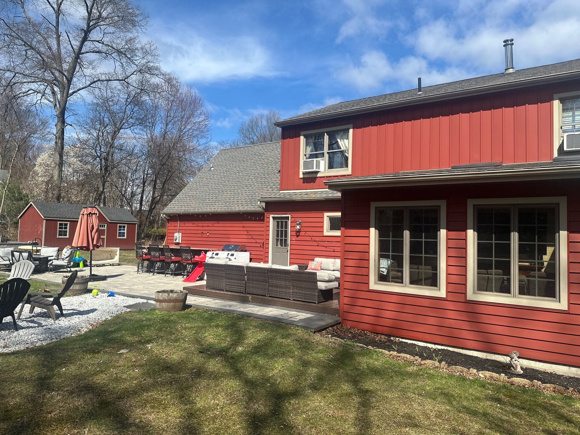 Red Siding in Beaver Dam NY by roberts roofing