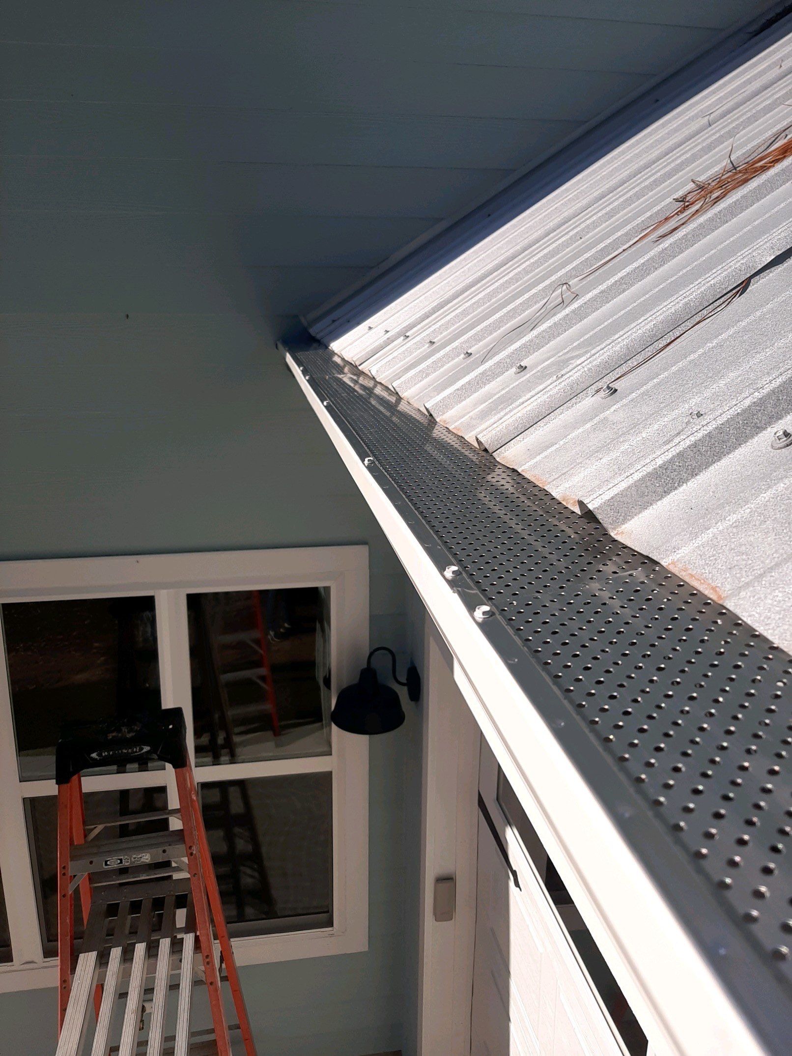 Gutter Installation using K-Style Seamless Gutters and Gutter Guards by Gutter Professors