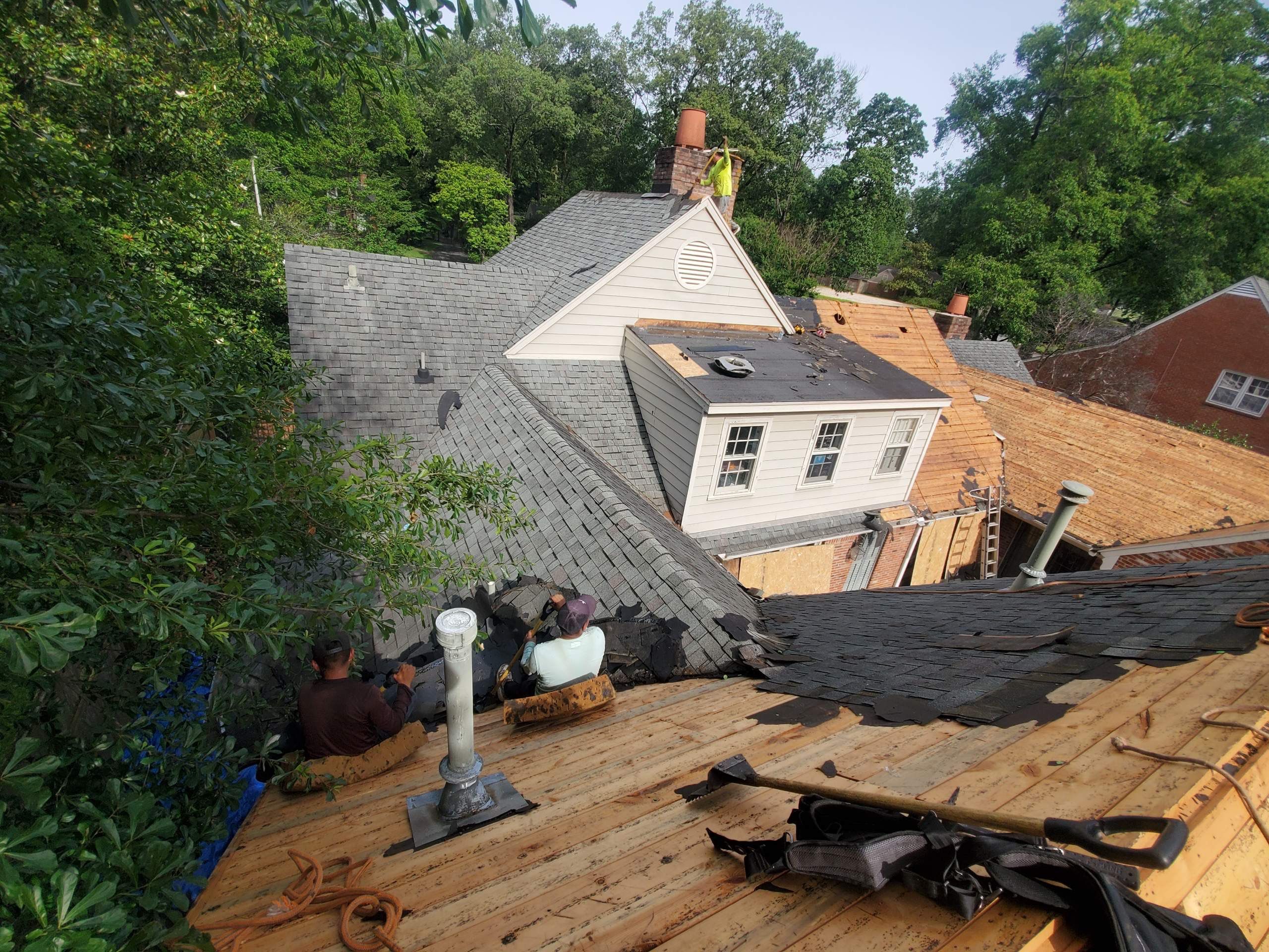 Full Roof Replacement with gutter upgrade after tree impact damage in East Memphis by Revival Roofing Services
