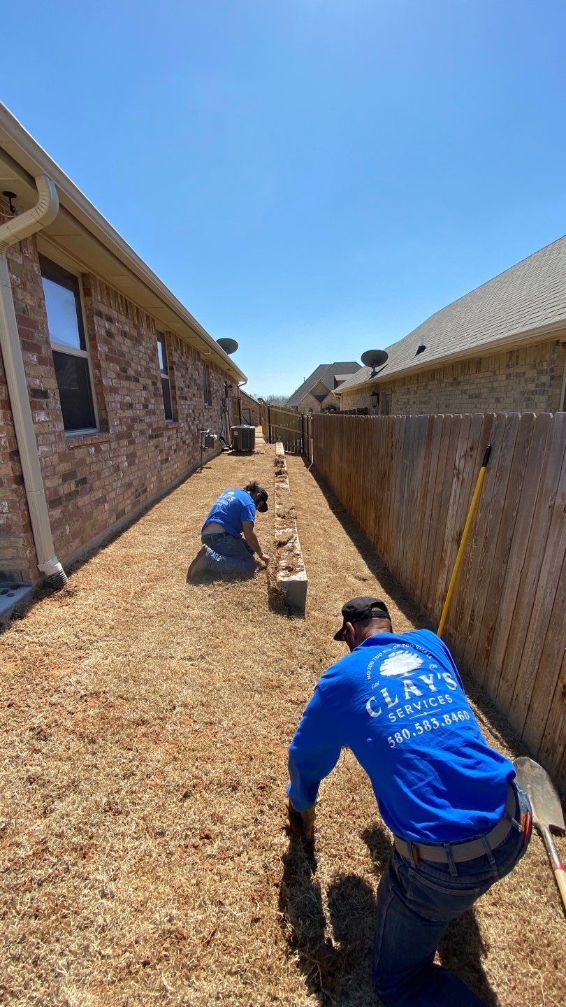 Concrete Slab , Retaining Wall , Fence, and landscape. by Clays Services Inc