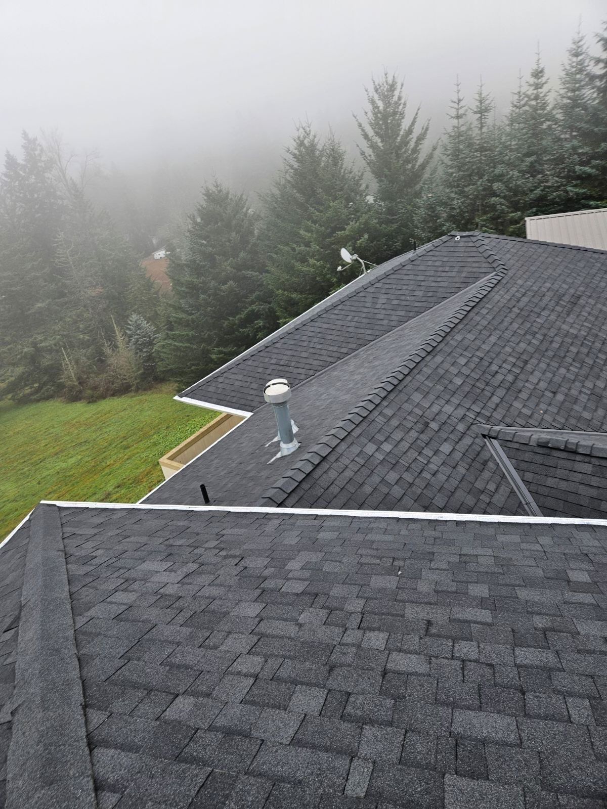 Charcoal Gray Shingles by Reimagine Roofing