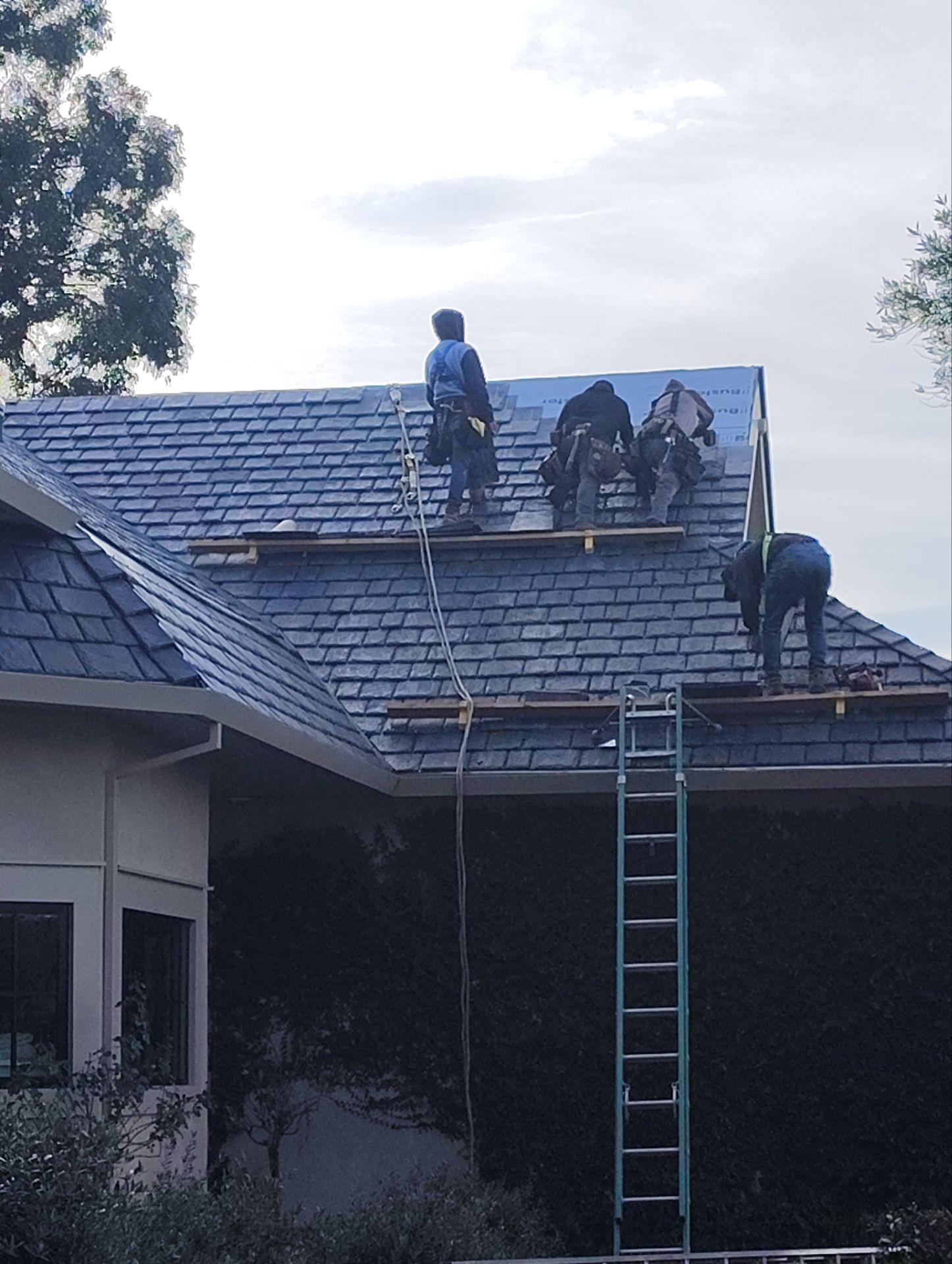 Residential Roofing Installation using Slate by Acker Roofing