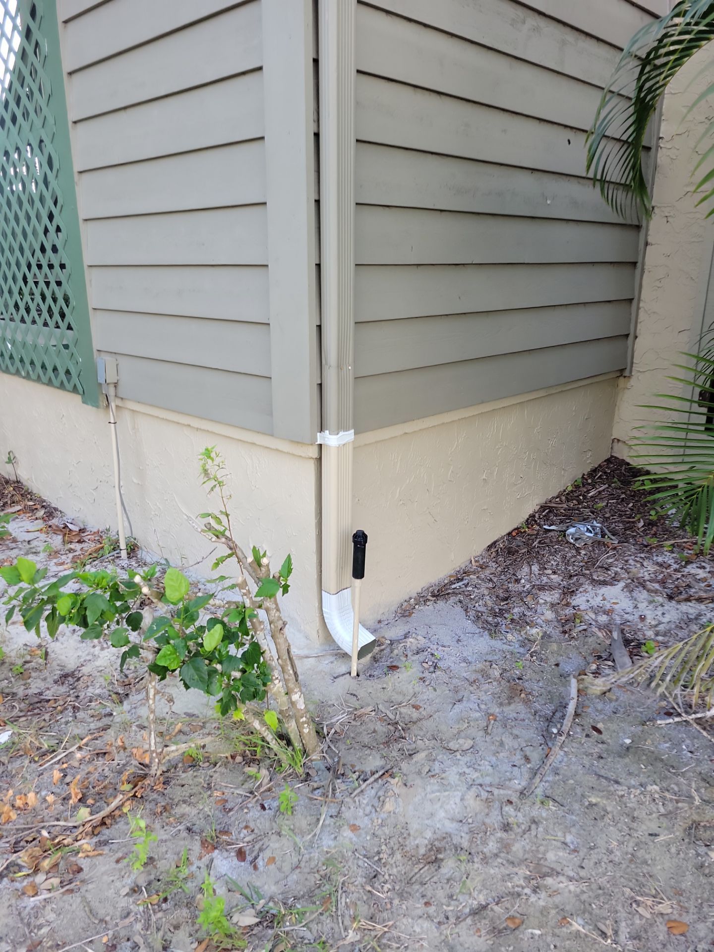 White Gutters Repair and Installation in Sarasota FL by Gutter Professors