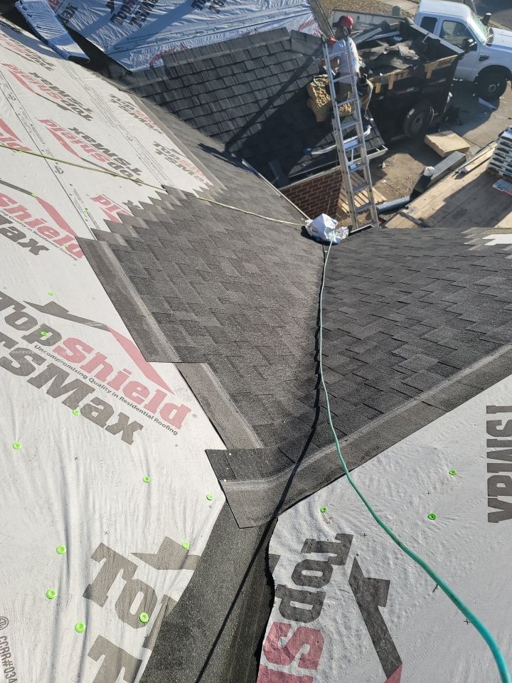 Residential Roofing Installation using Roof Replacement by American Roofing & Construction LLC