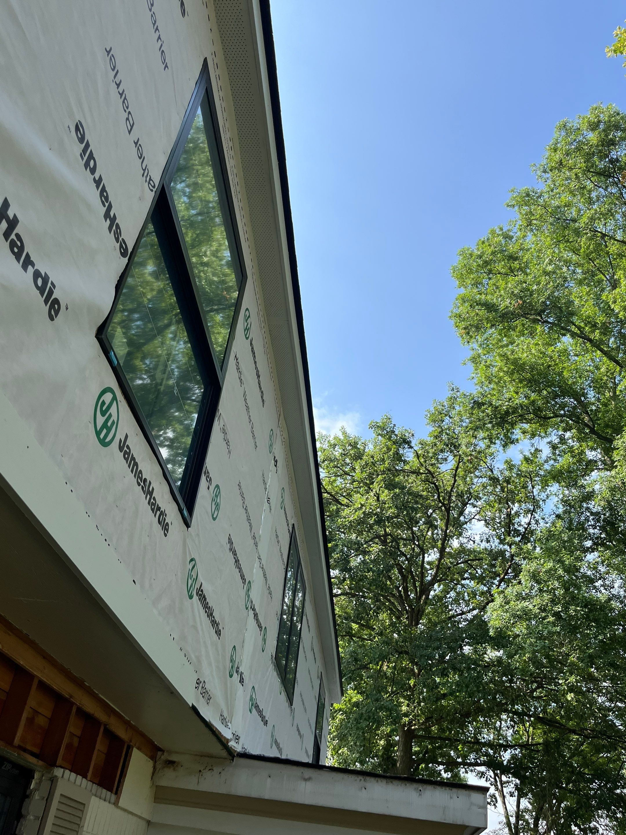 Siding Replacement using Hardie Plank S8 1/4"  Arctic White by 180 Contractors