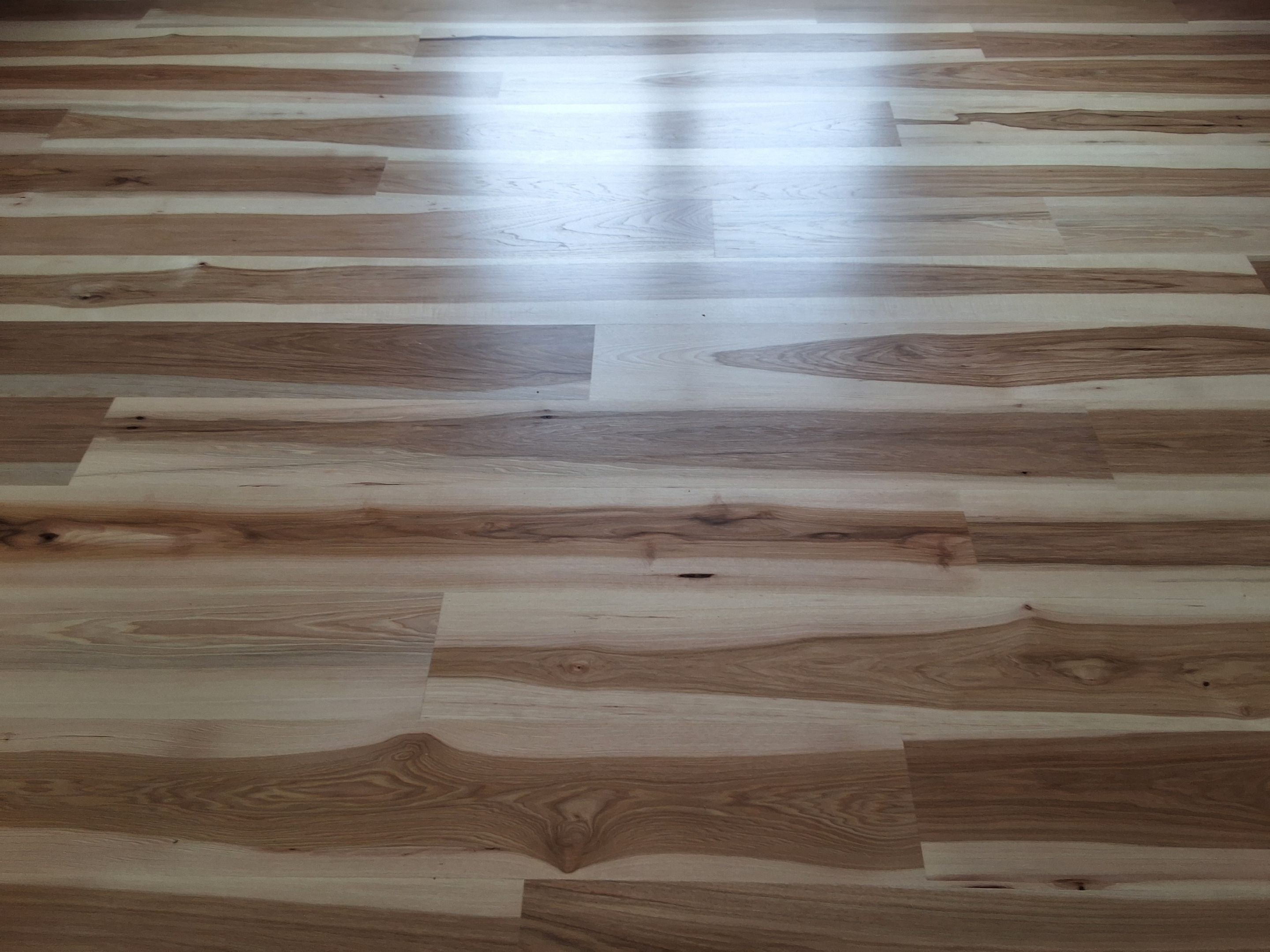 Wide plank natural calico hickory by Ann Arbor Hardwoods 
