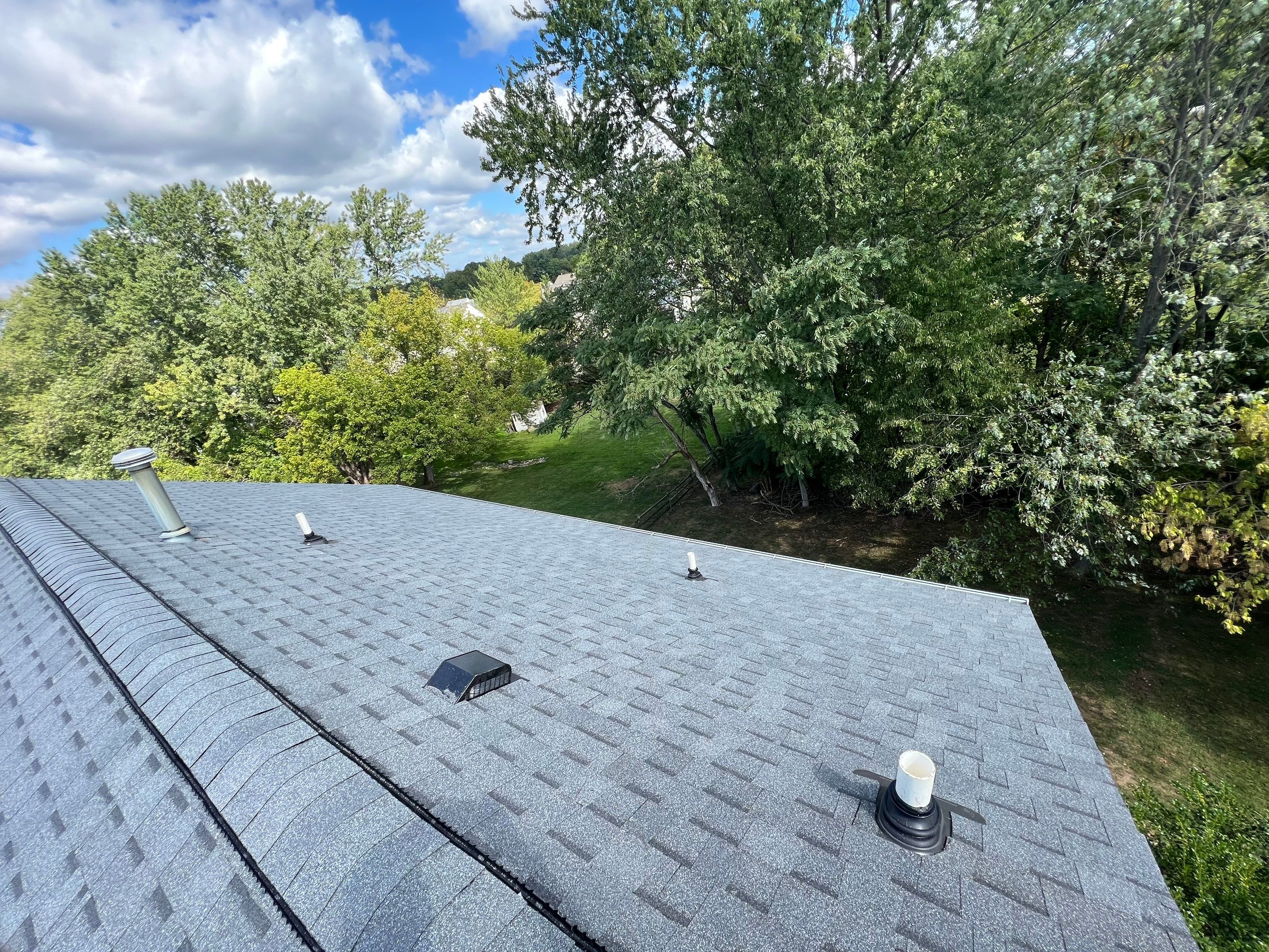 Residential Roofing Installation using Atlas Pinnacle Pristine Pewter Architectural Shingles by Frederick Roof Repair